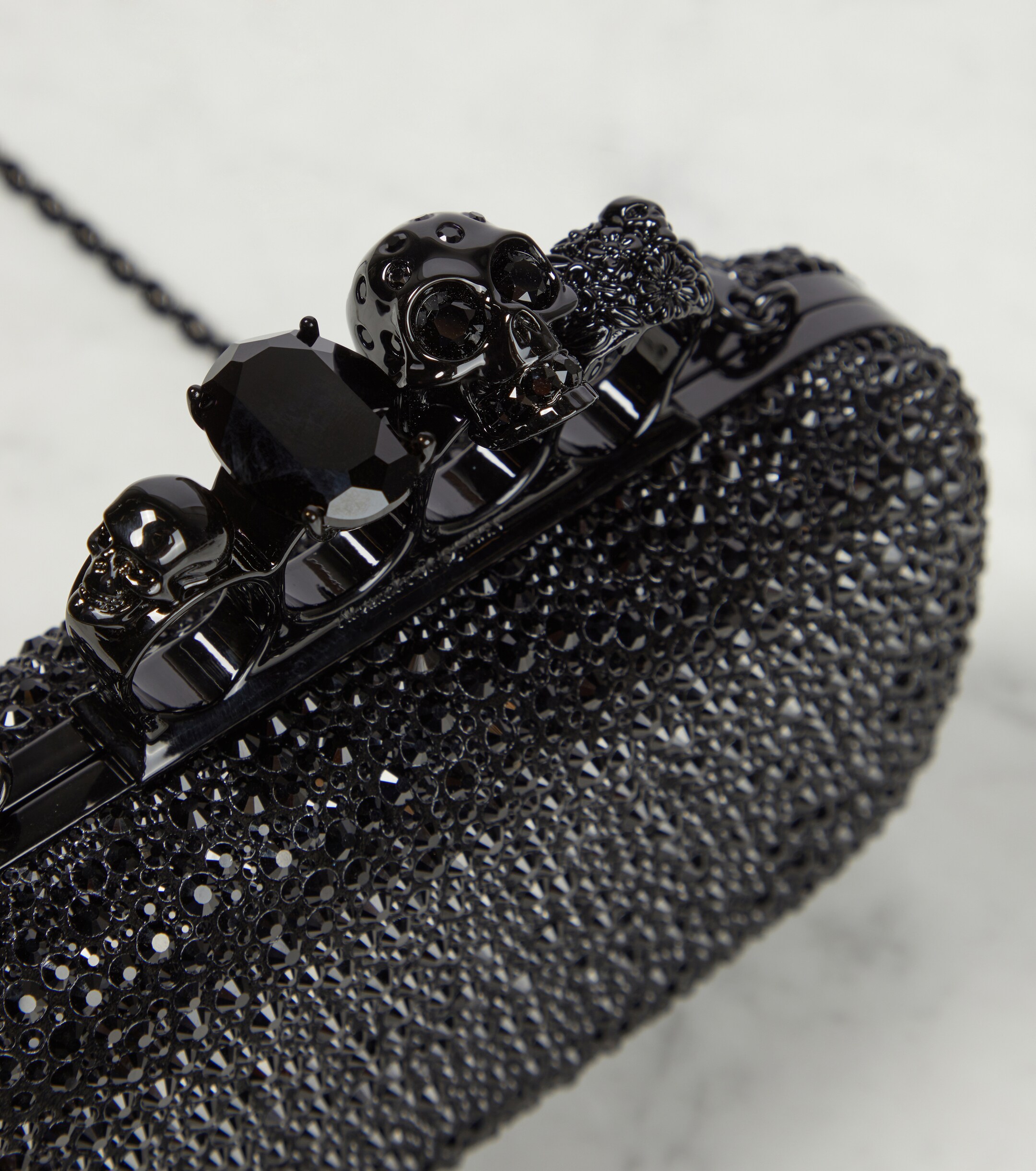McQueen Knuckle embellished leather clutch