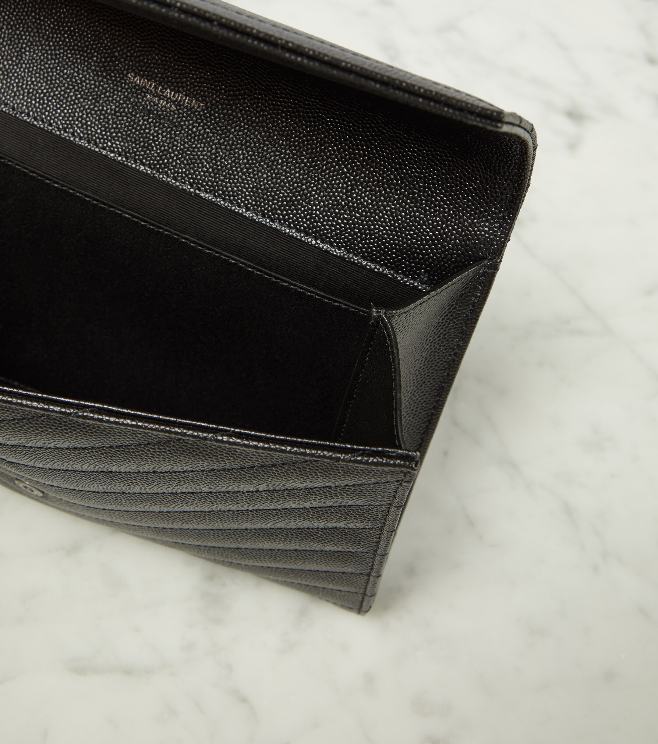 Saint Laurent Cassandre matelassé leather clutch