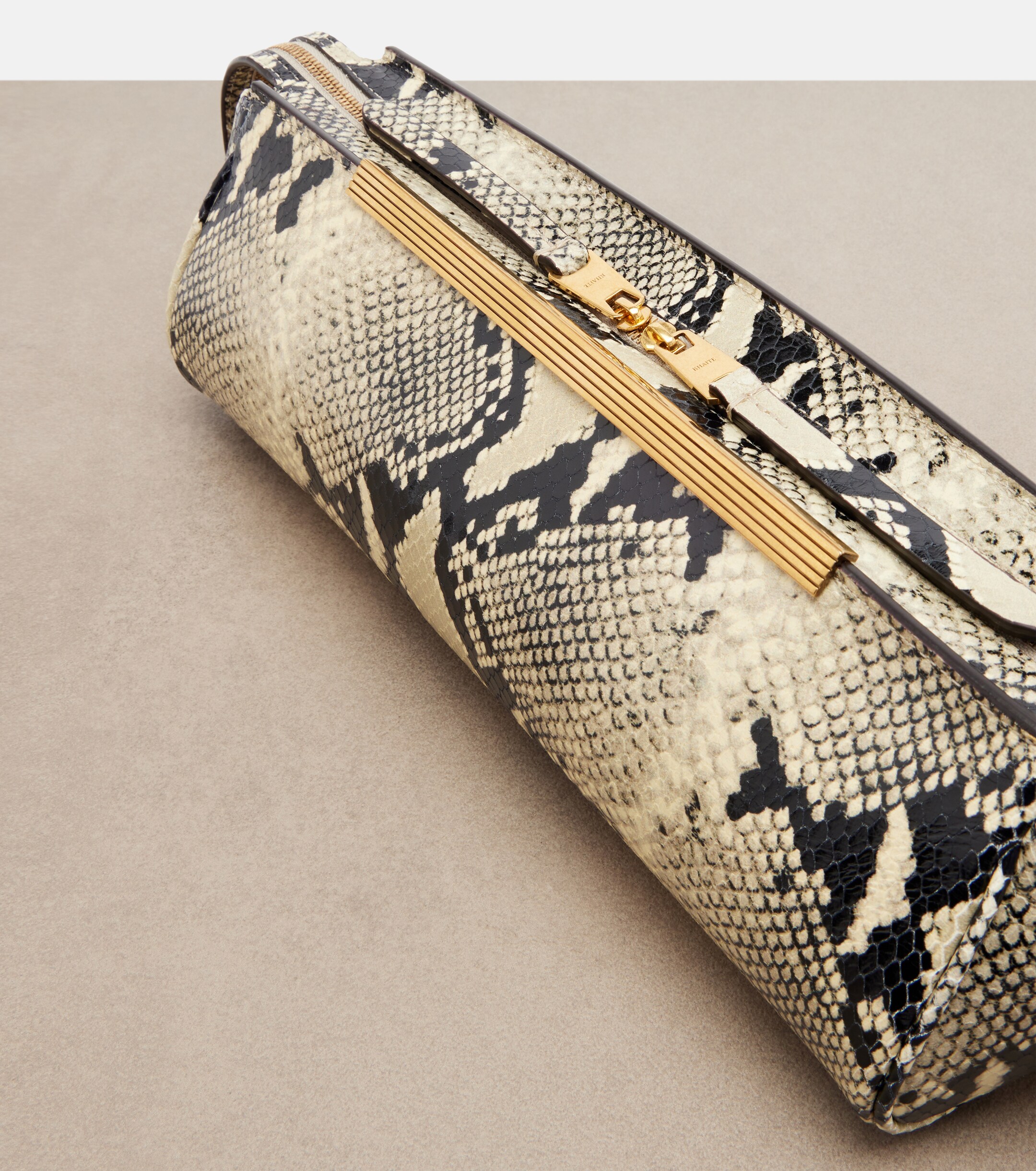 KHAITE Donna leather clutch