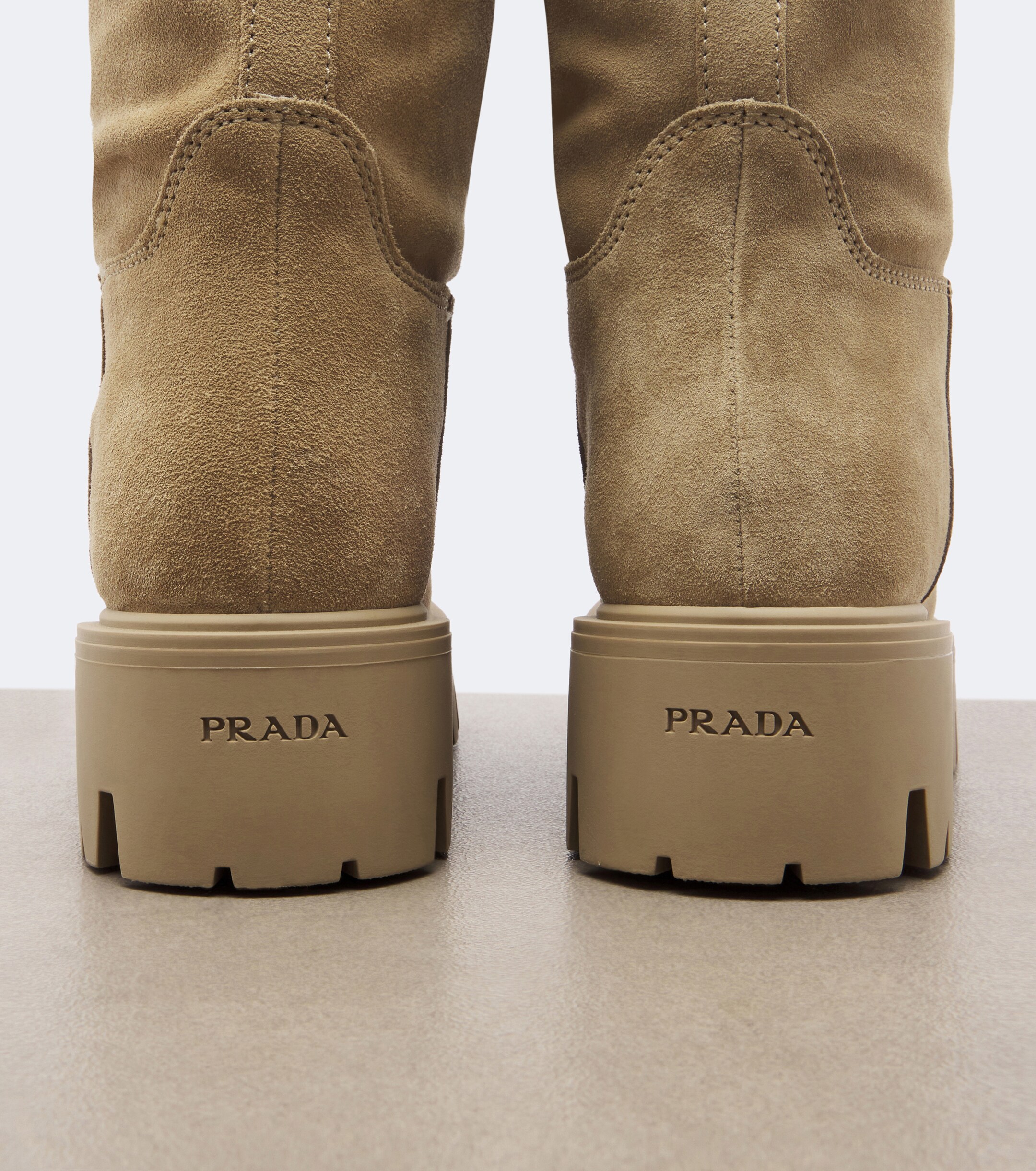 Prada Prada Shearling-lined suede knee-high boots