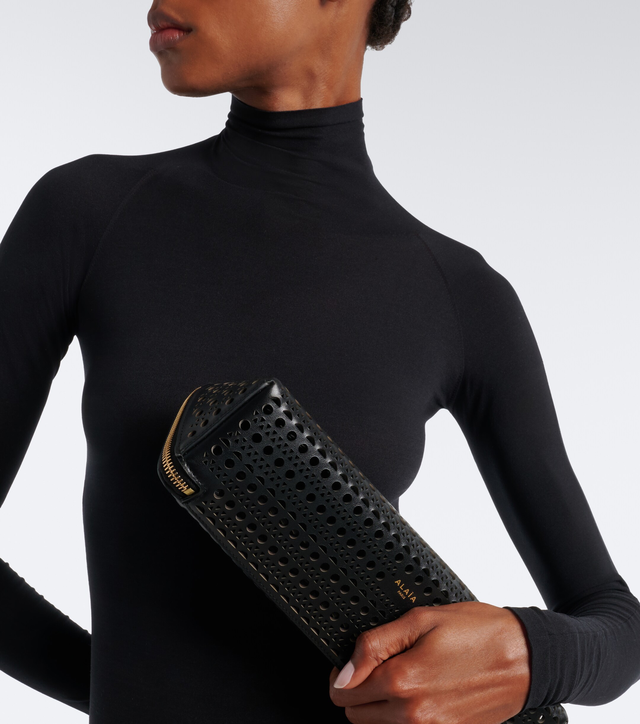 Alaïa Delta Small leather clutch