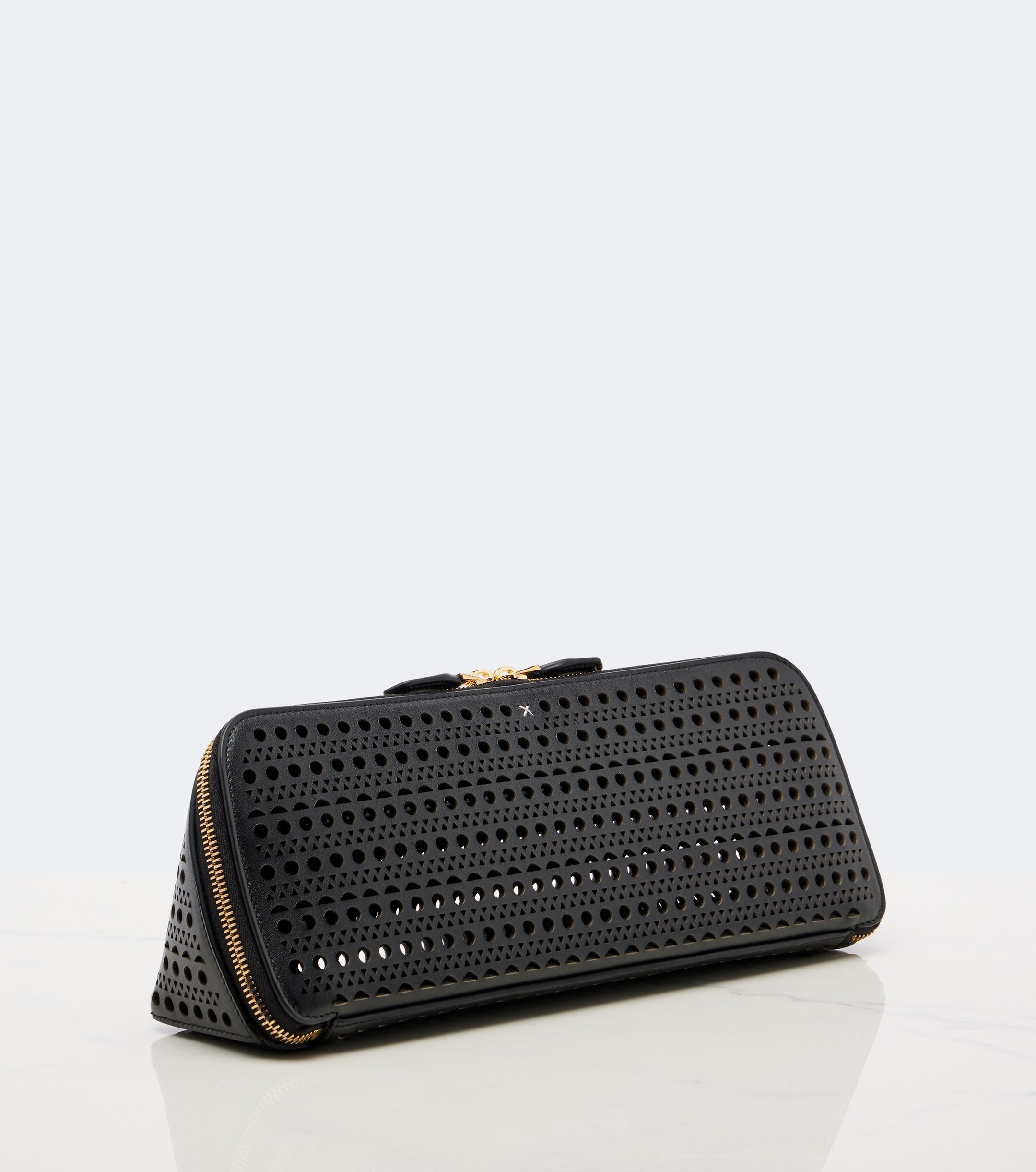 Alaïa Delta Small leather clutch