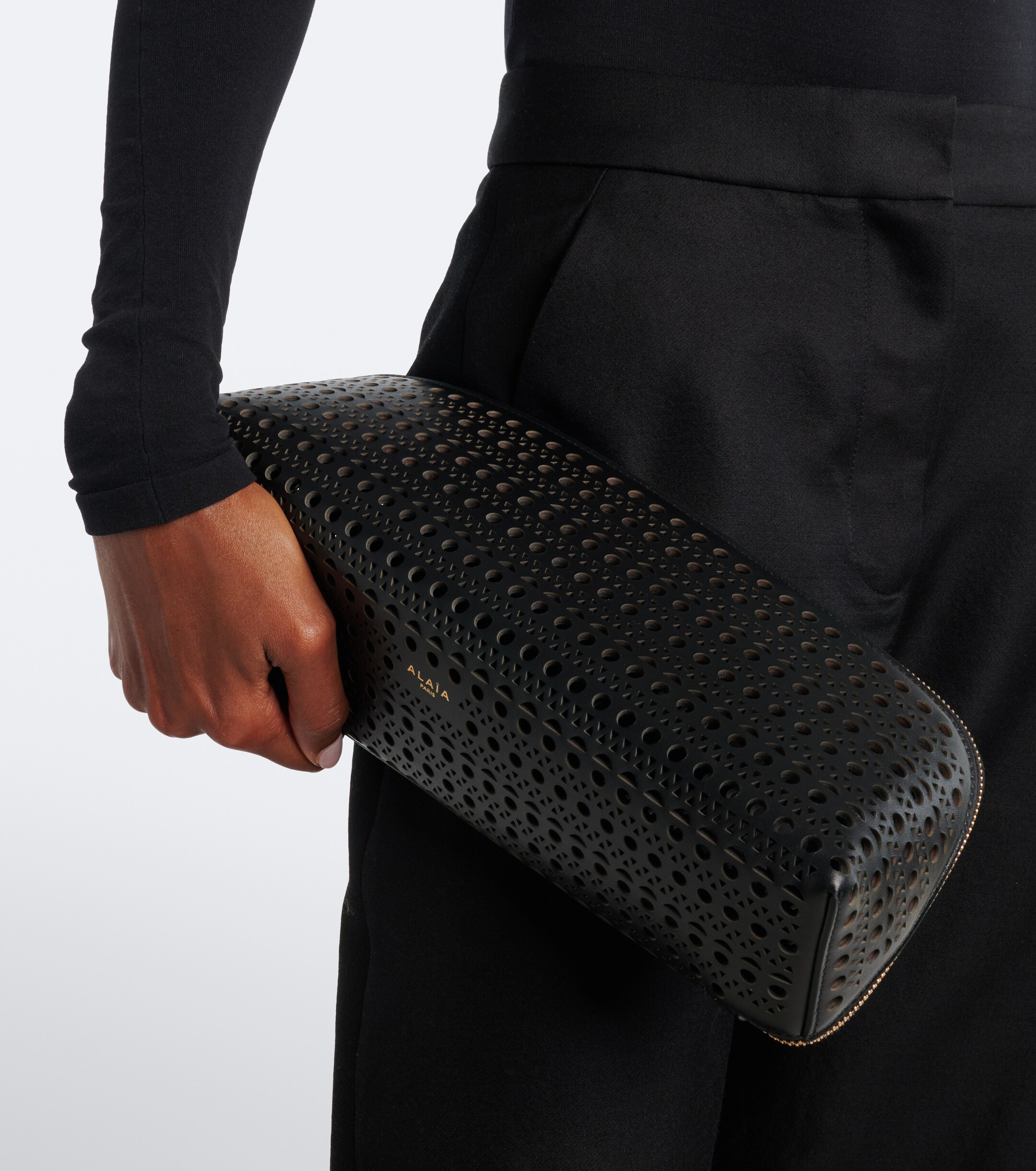 Alaïa Delta Small leather clutch