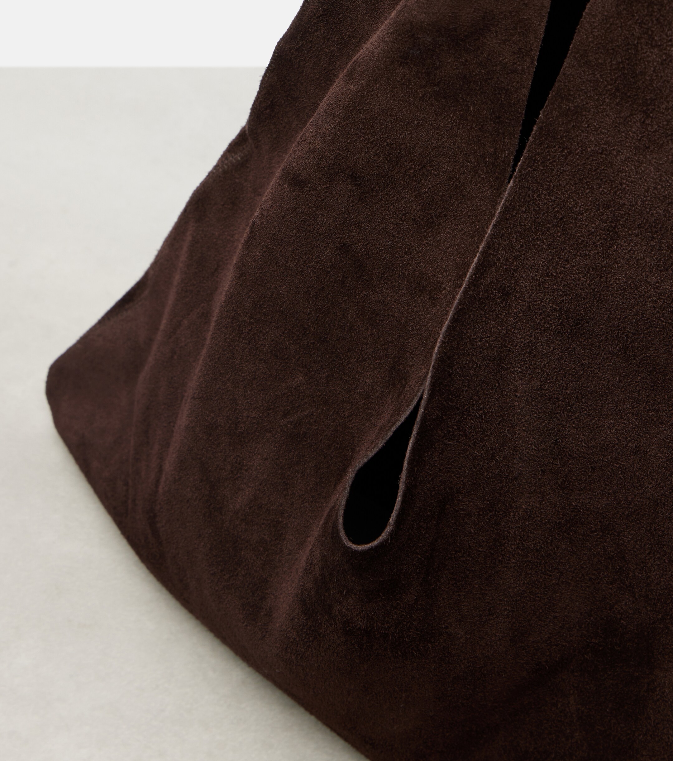 The Row Bindle Small suede top-handle bag