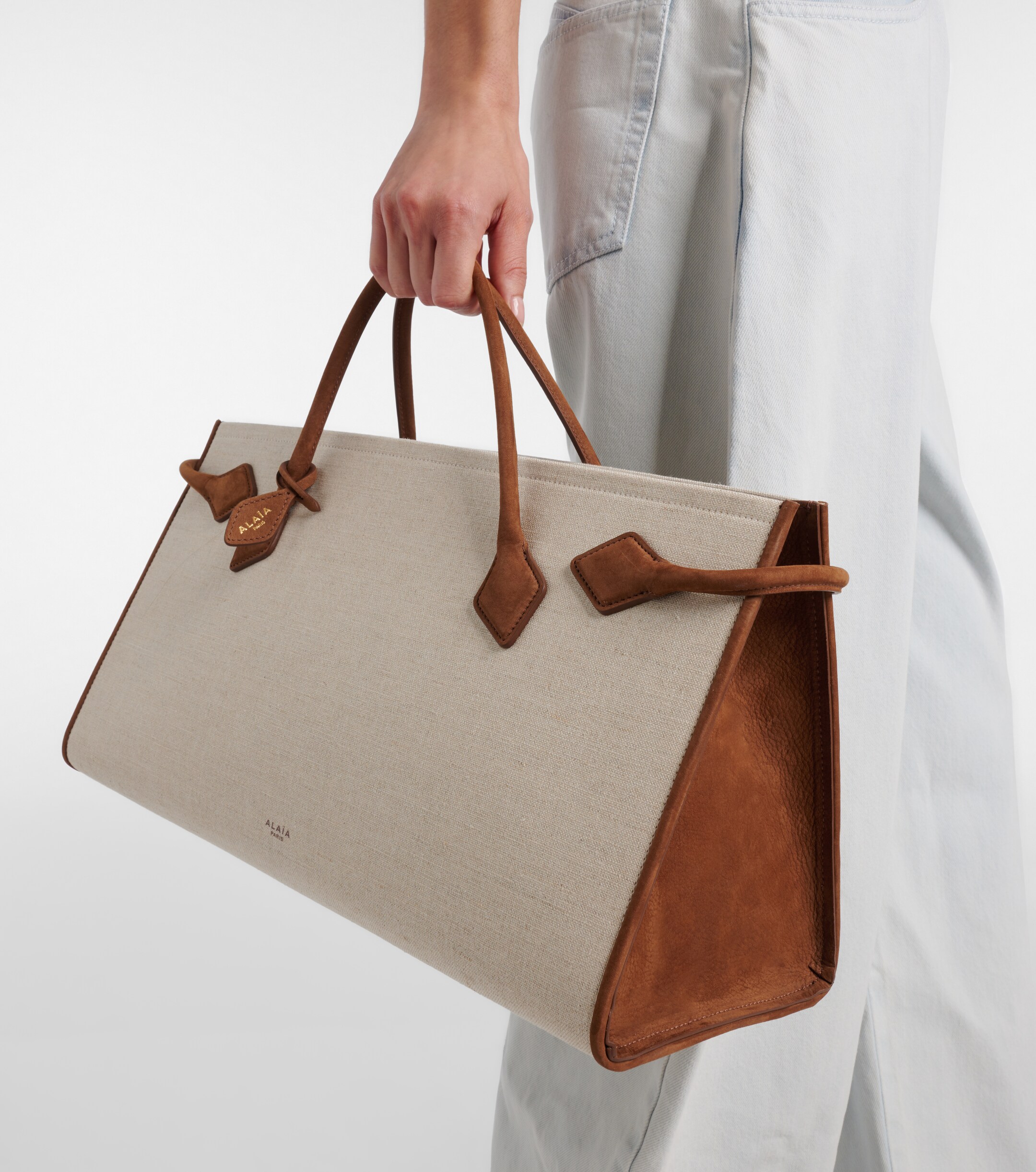 Alaïa Le Teckel leather-trimmed canvas tote bag