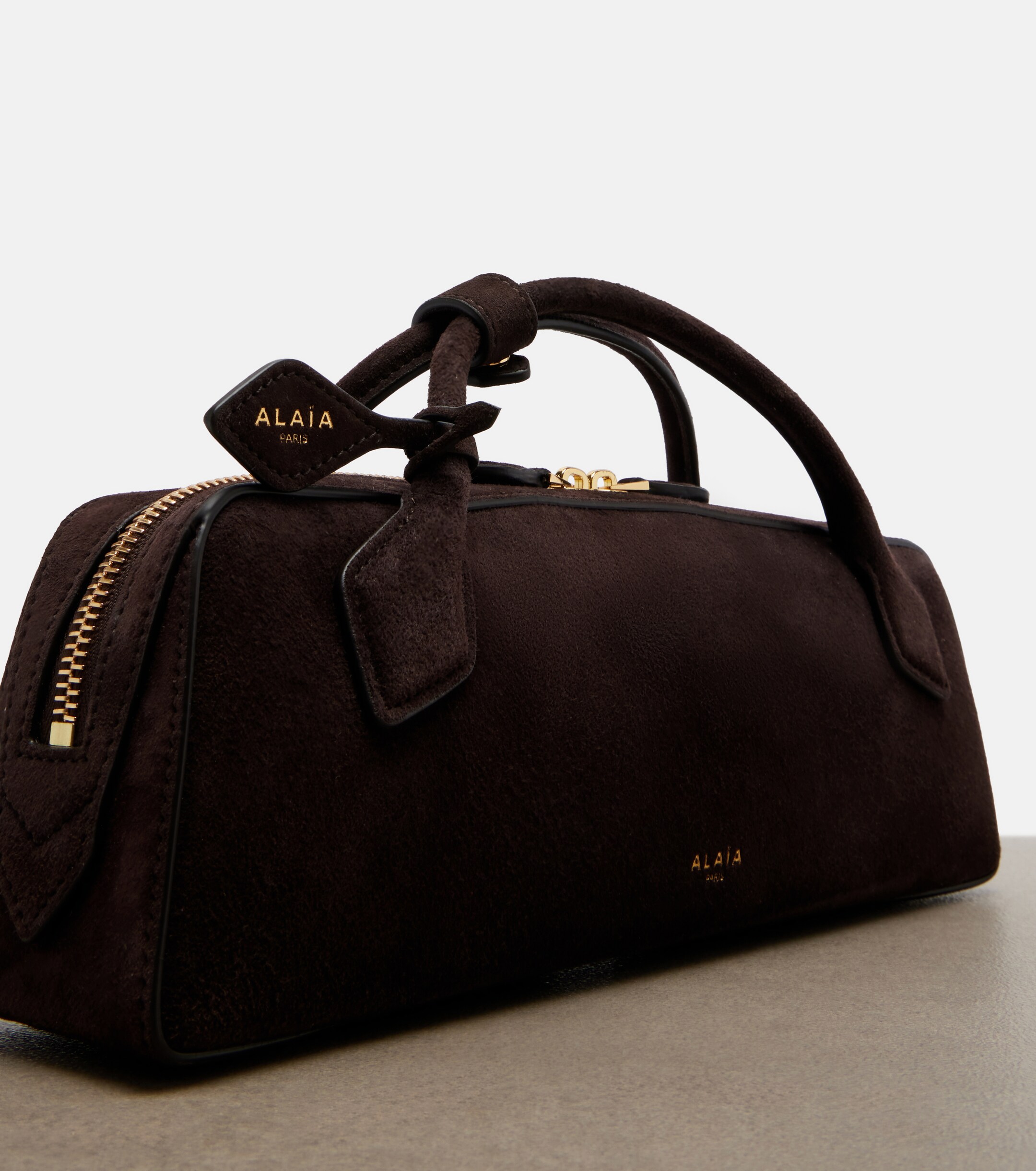 Alaïa Le Teckel Small suede clutch