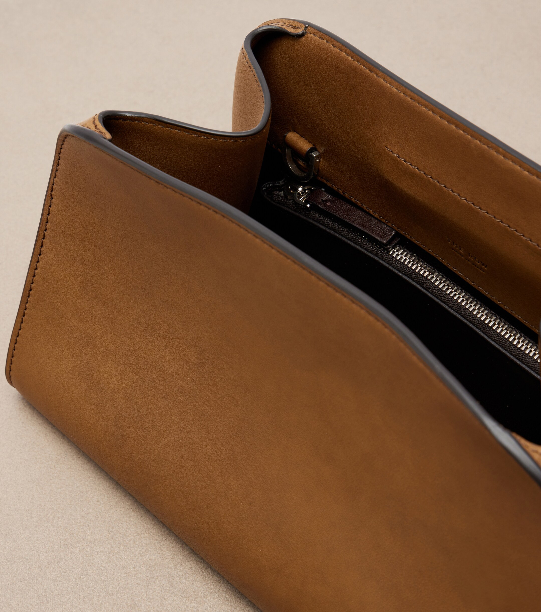 The Row Peggy leather clutch
