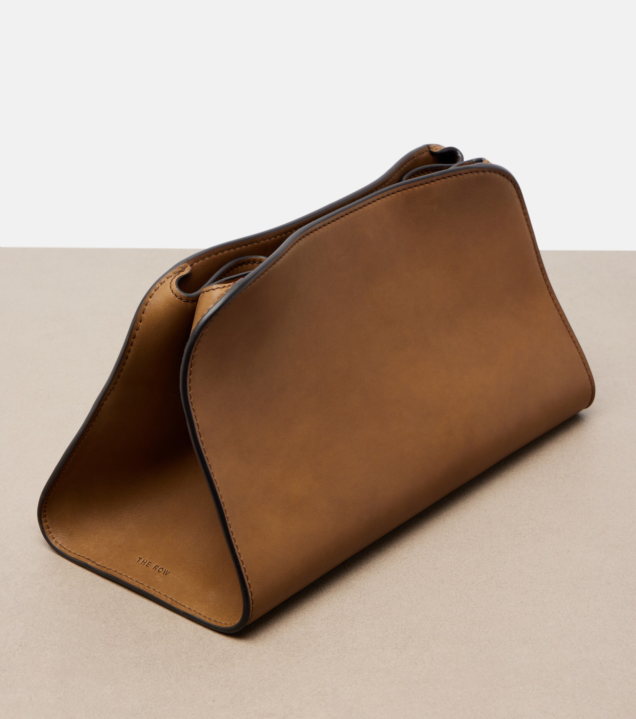 The Row Peggy leather clutch