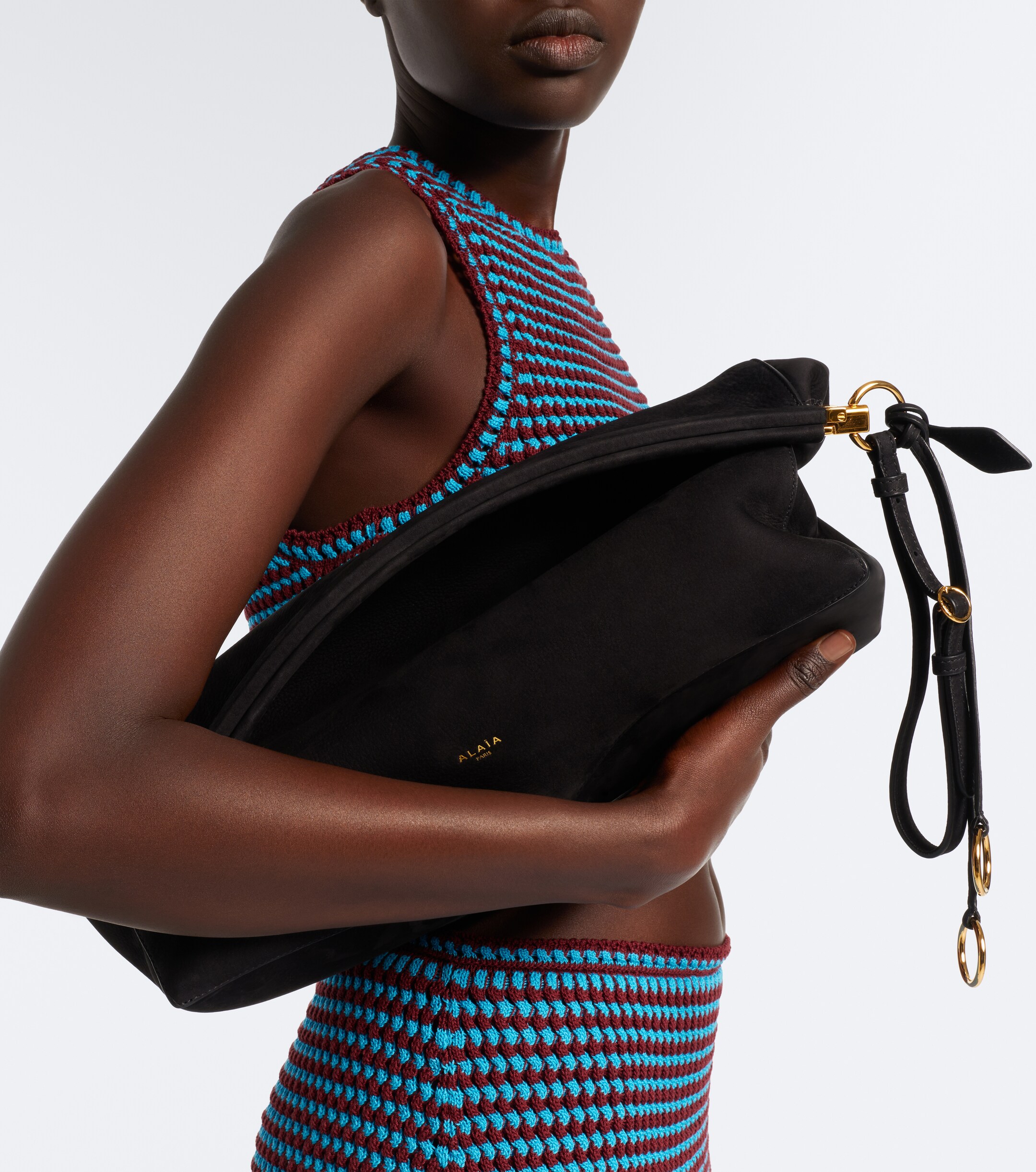 Alaïa Le Click Medium leather clutch