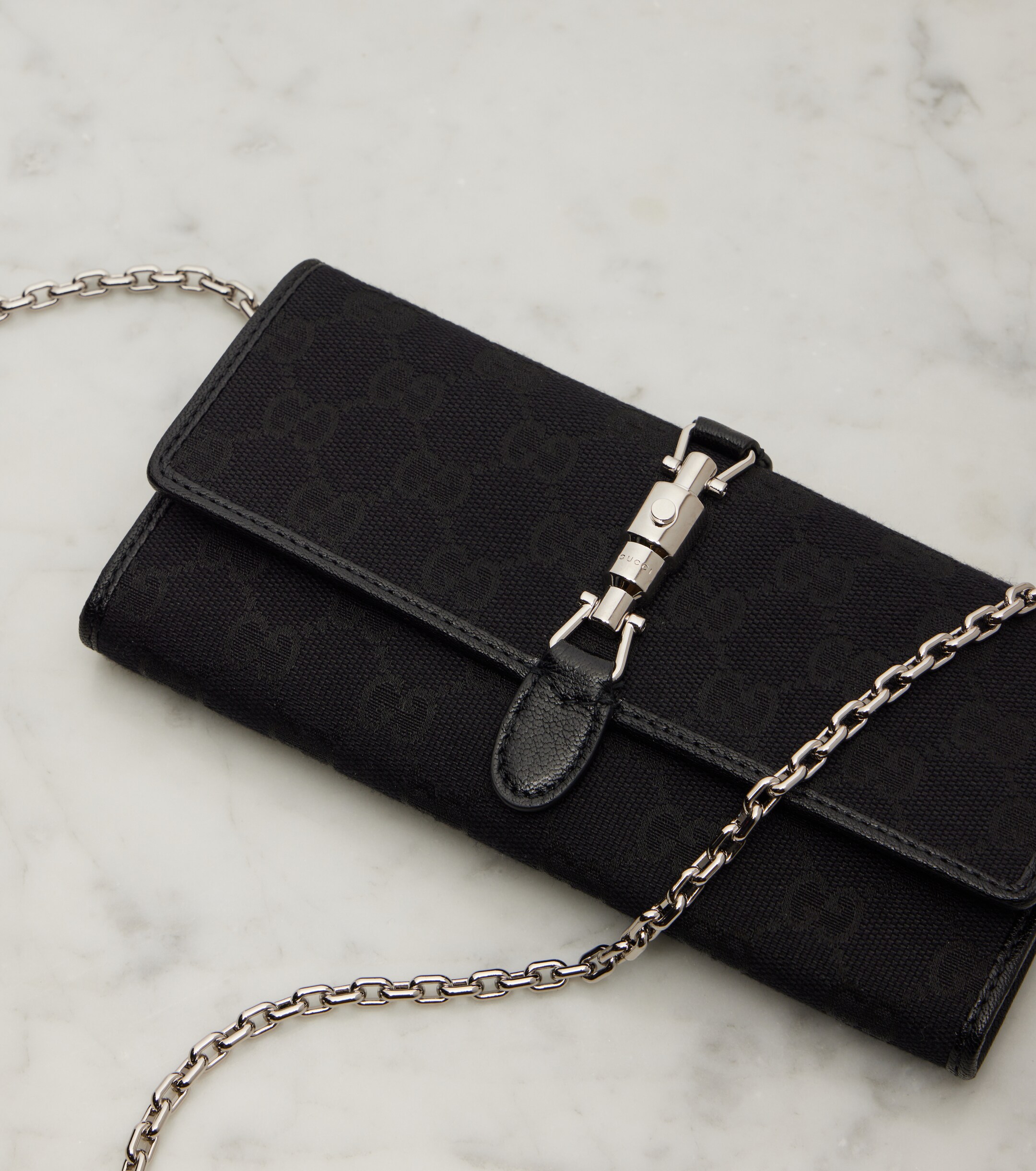 Gucci Gucci Jackie GG Canvas clutch