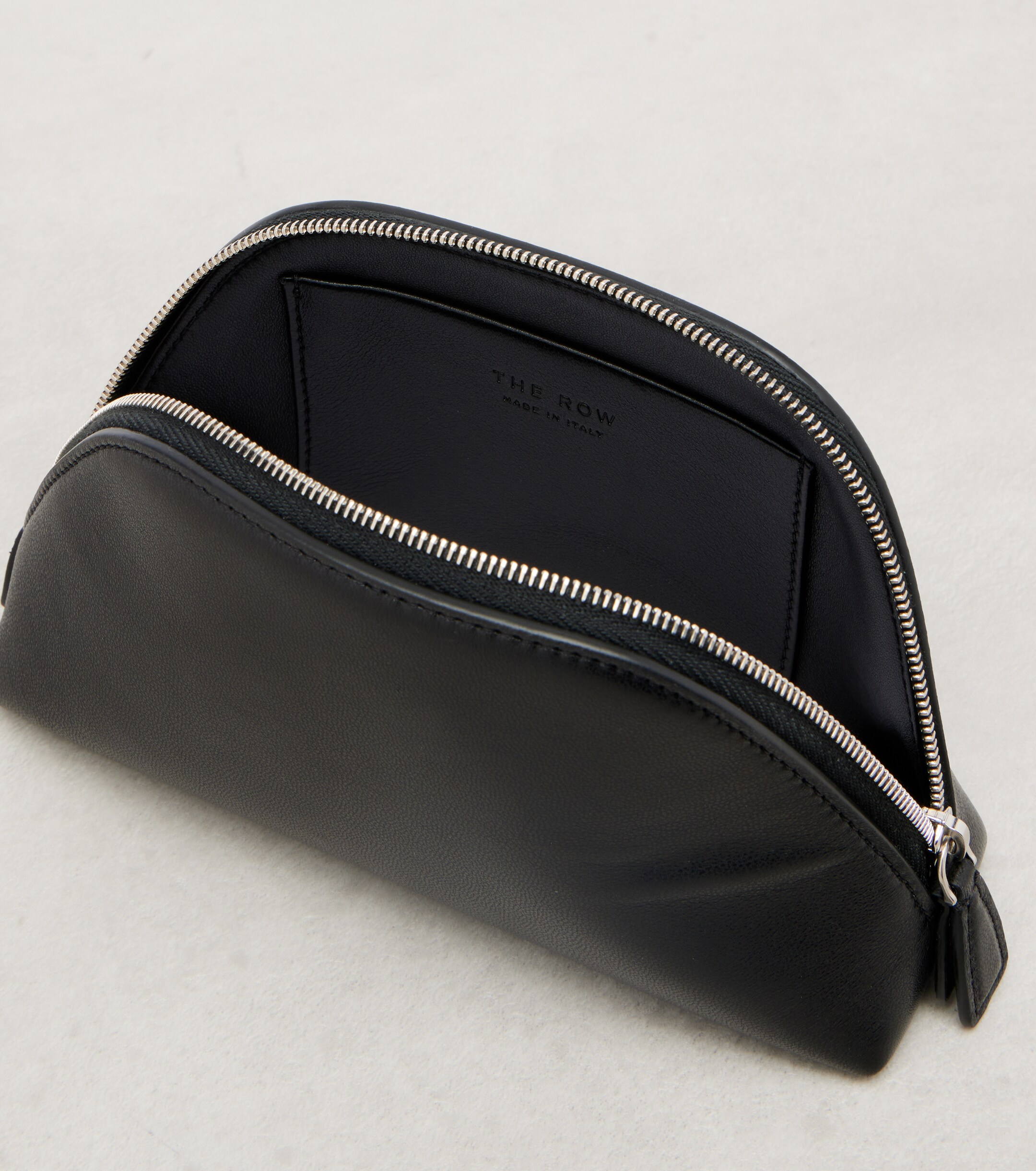 The Row Devon Mini leather clutch