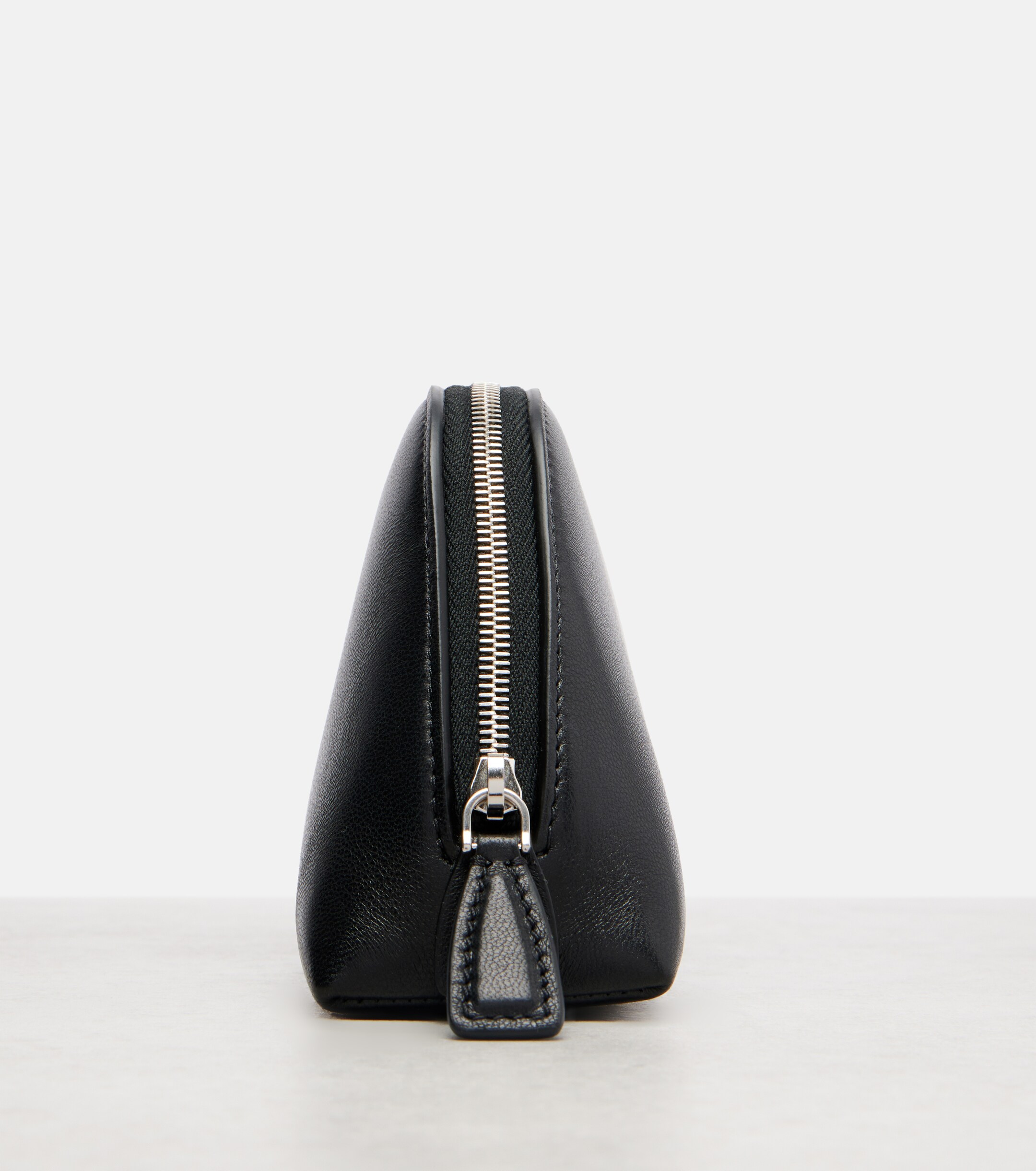 The Row Devon Mini leather clutch