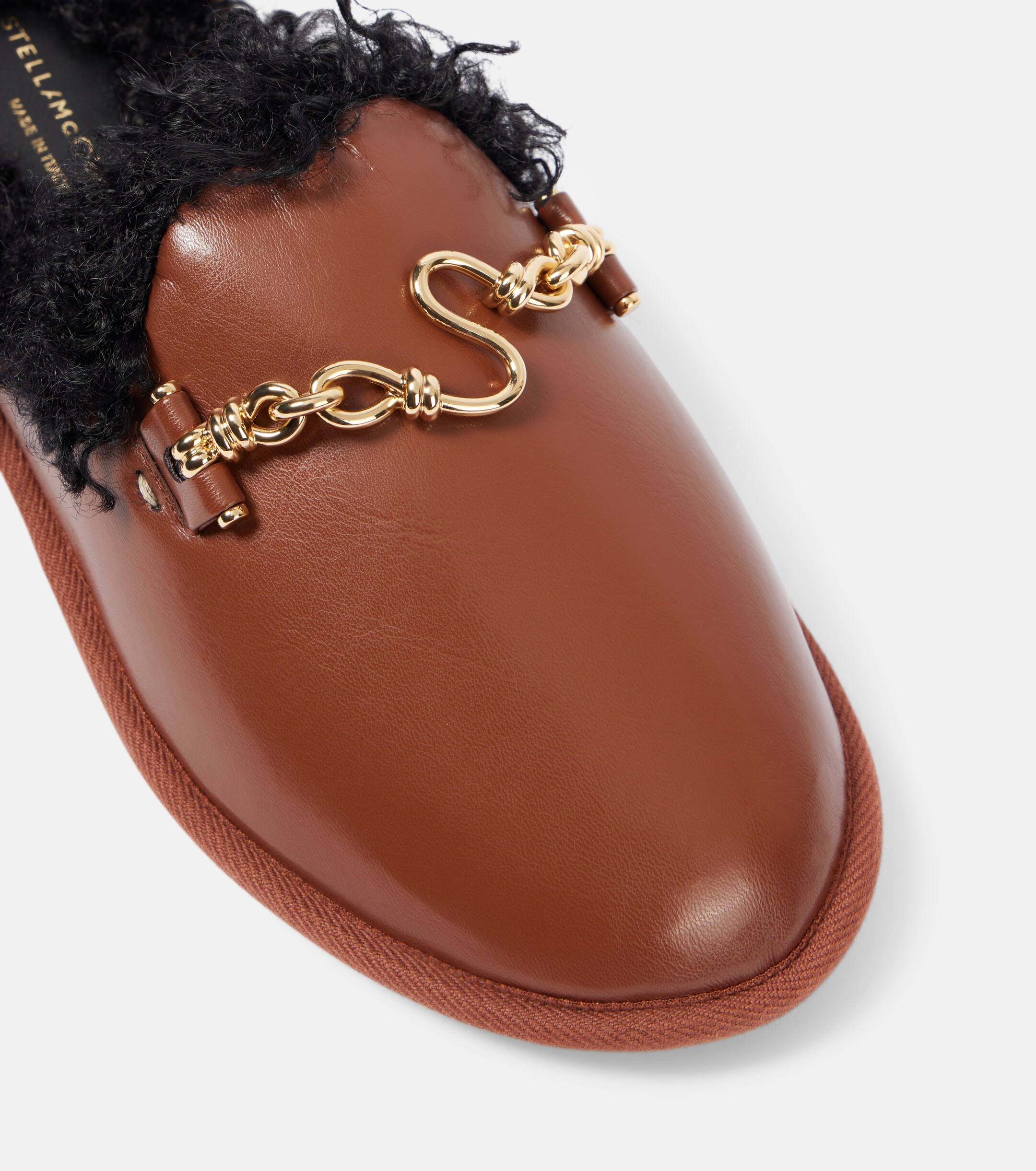 Stella McCartney Ryder teddy-trimmed faux leather mules