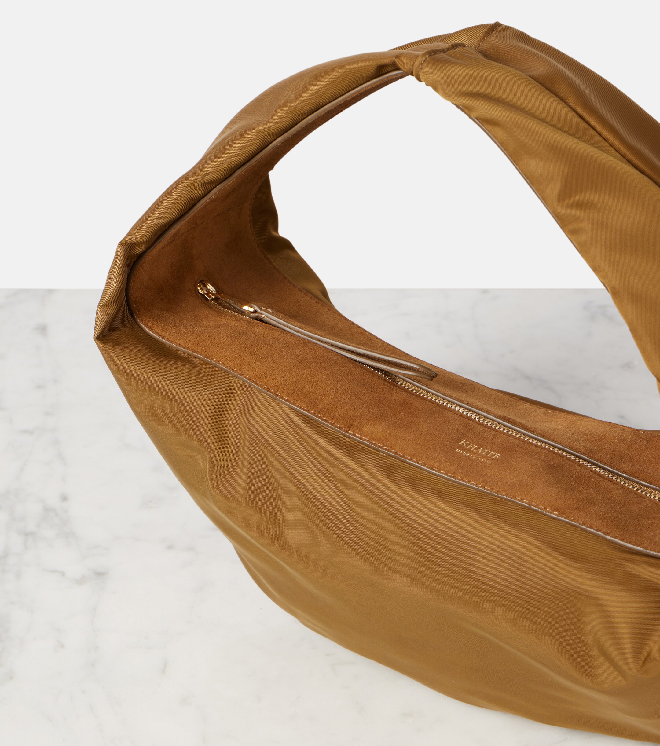 KHAITE Olivia Medium suede-trimmed shoulder bag