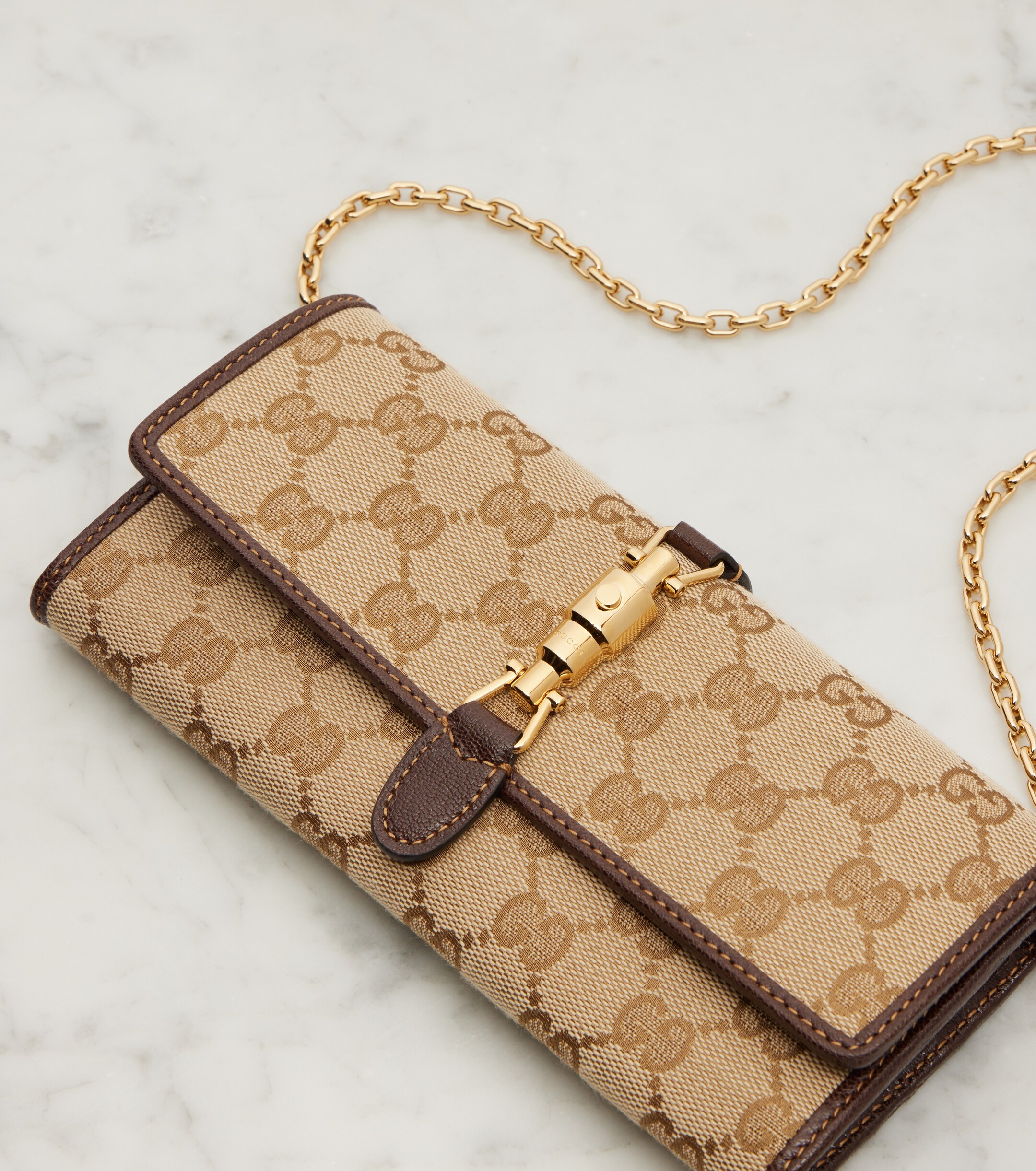 Gucci Gucci Jackie GG Canvas clutch