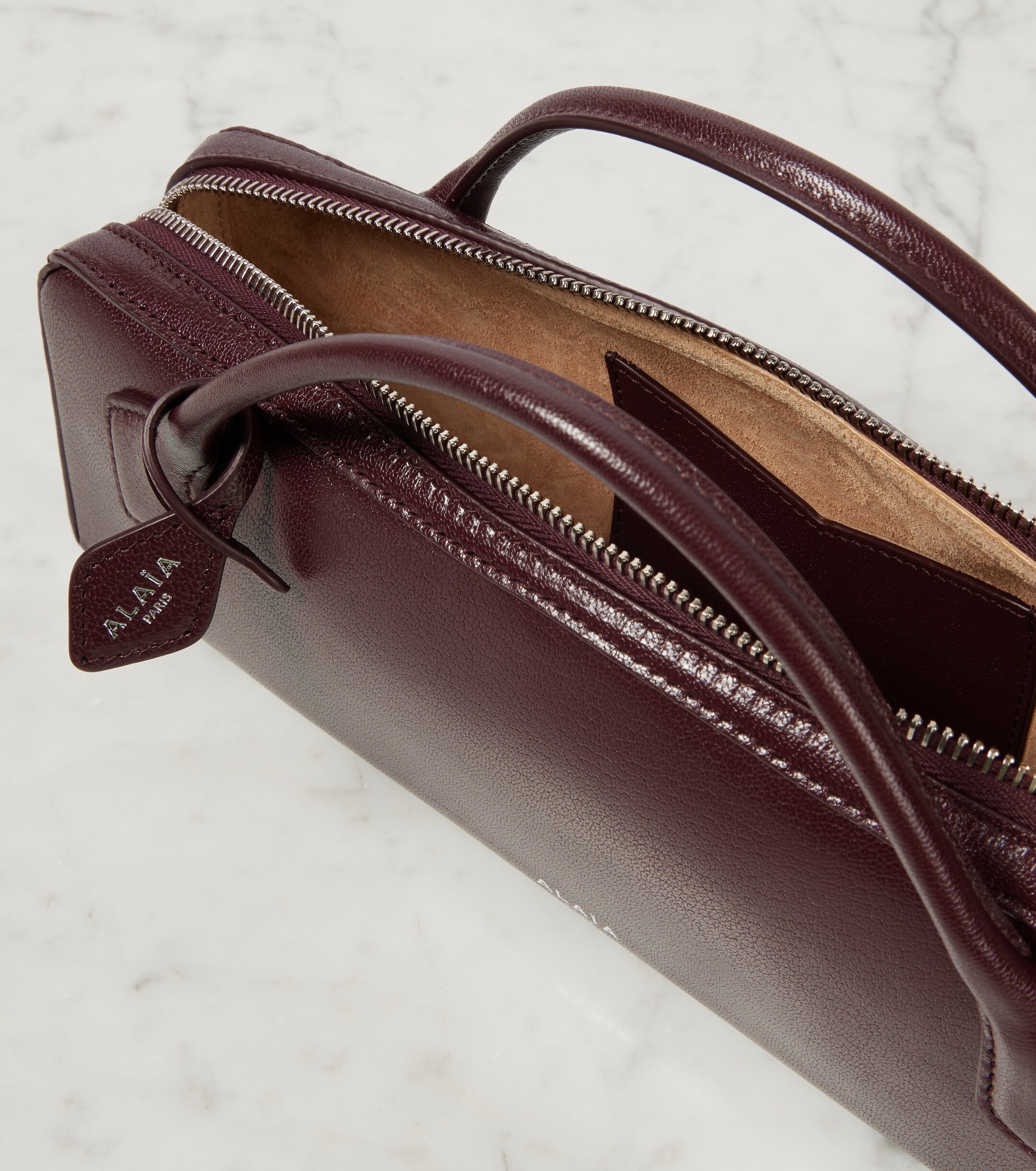 Alaïa Le Teckel leather clutch