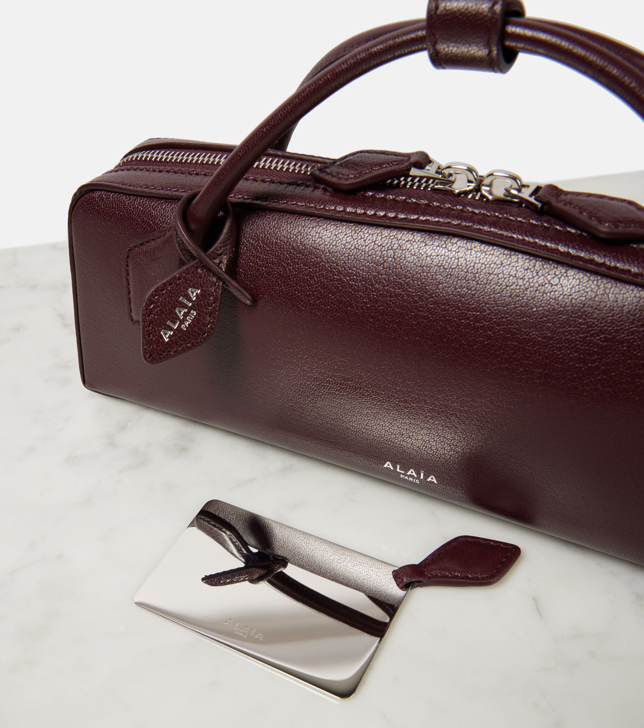 Alaïa Le Teckel leather clutch