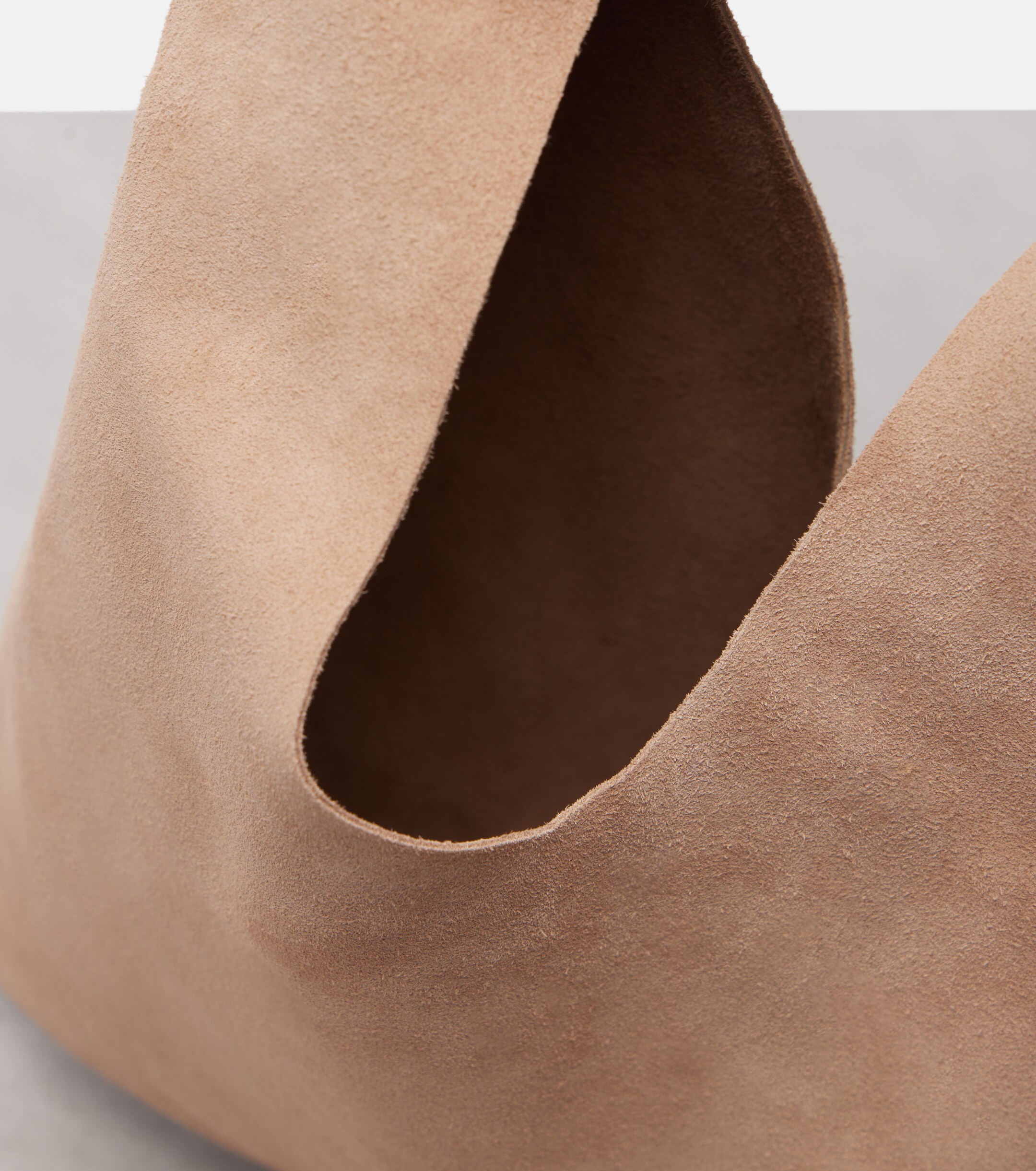 The Row Bindle Small suede top-handle bag