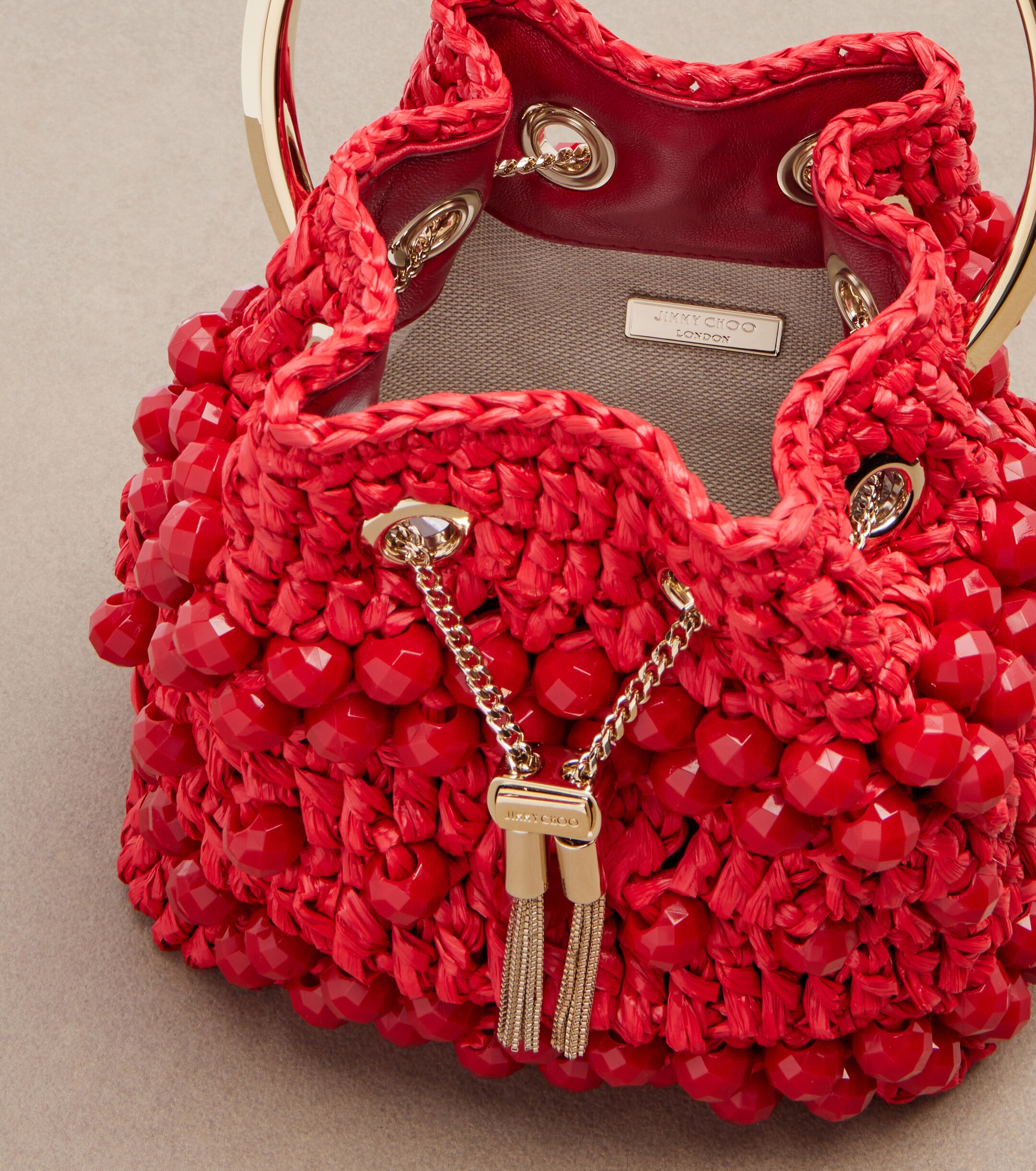 JIMMY CHOO Bon Bon beaded raffia bucket bag