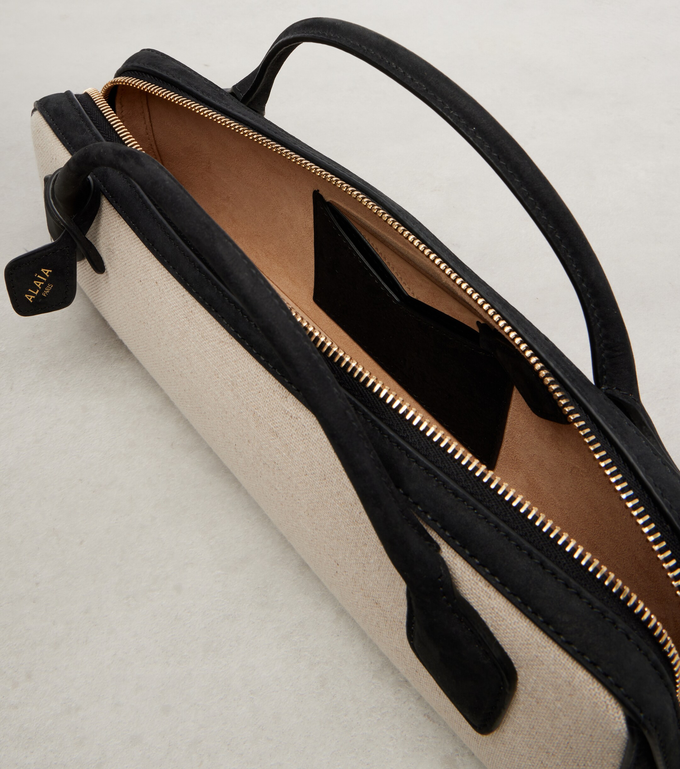 Alaïa Le Teckel canvas clutch
