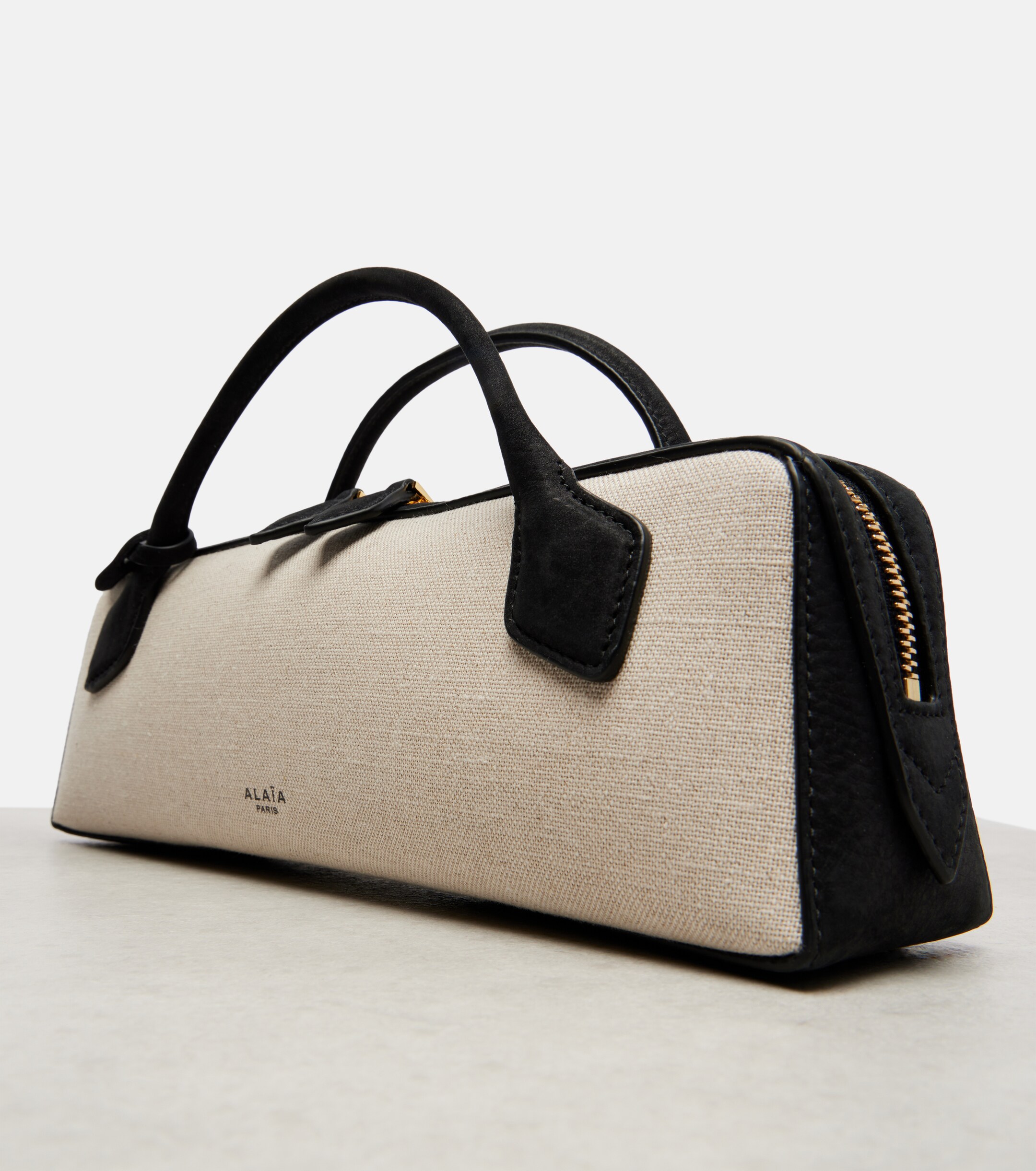 Alaïa Le Teckel canvas clutch