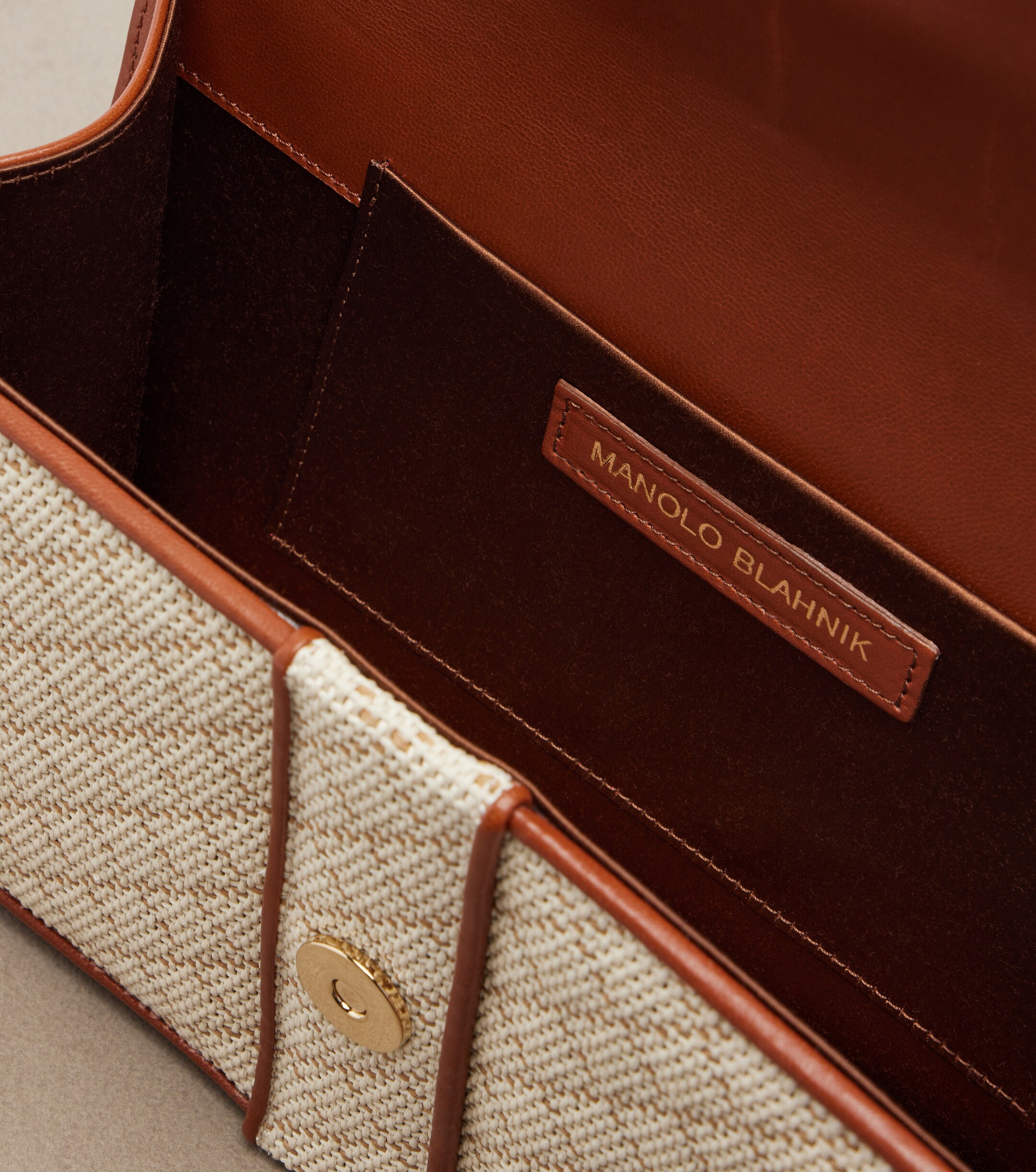 MANOLO BLAHNIK Maycap raffia-effect clutch