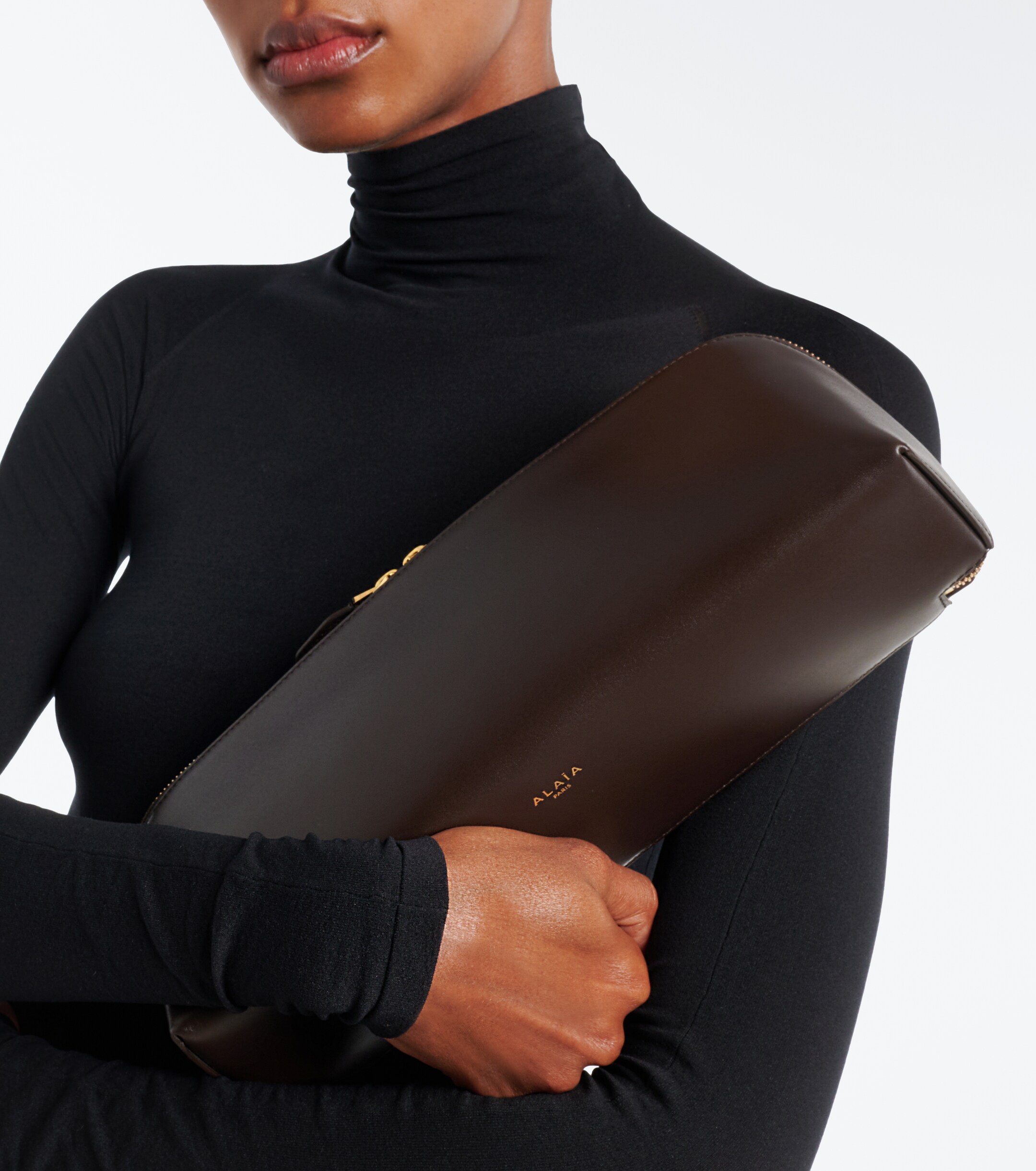 Alaïa Delta Small leather clutch