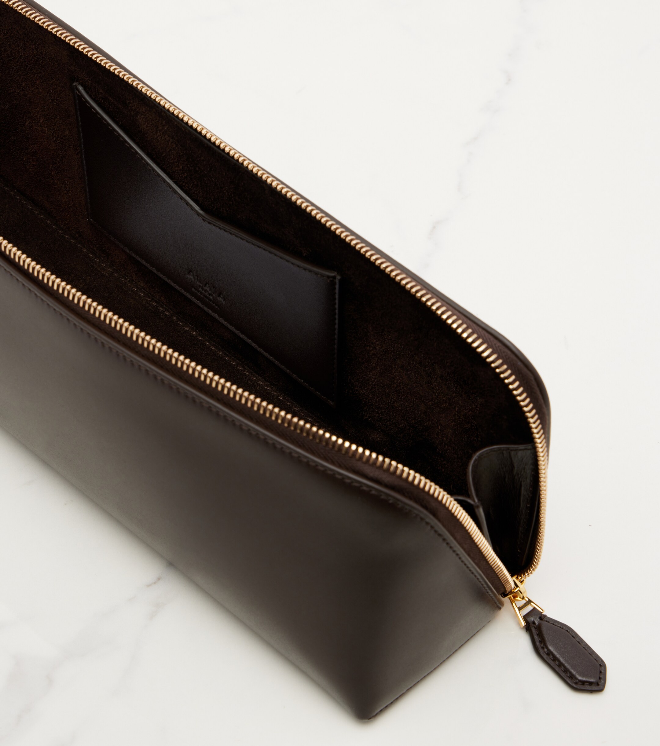 Alaïa Delta Small leather clutch