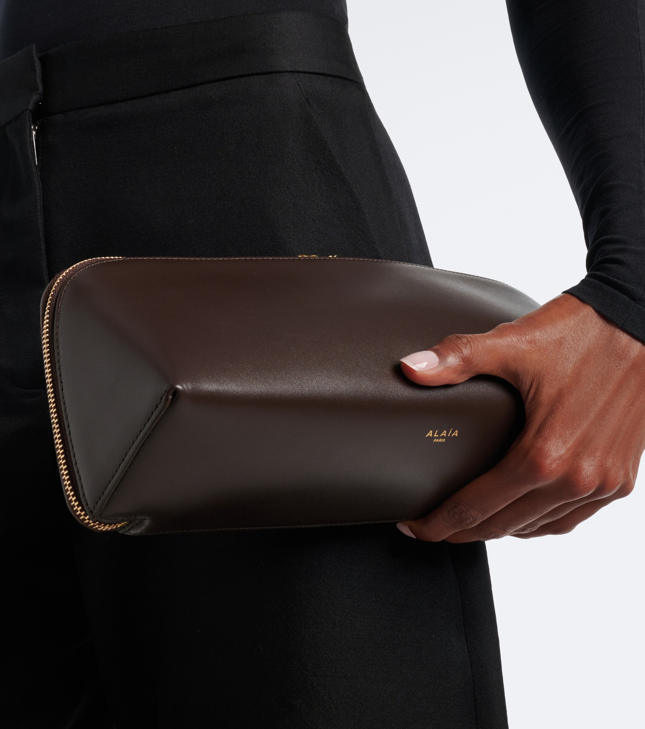 Alaïa Delta Small leather clutch