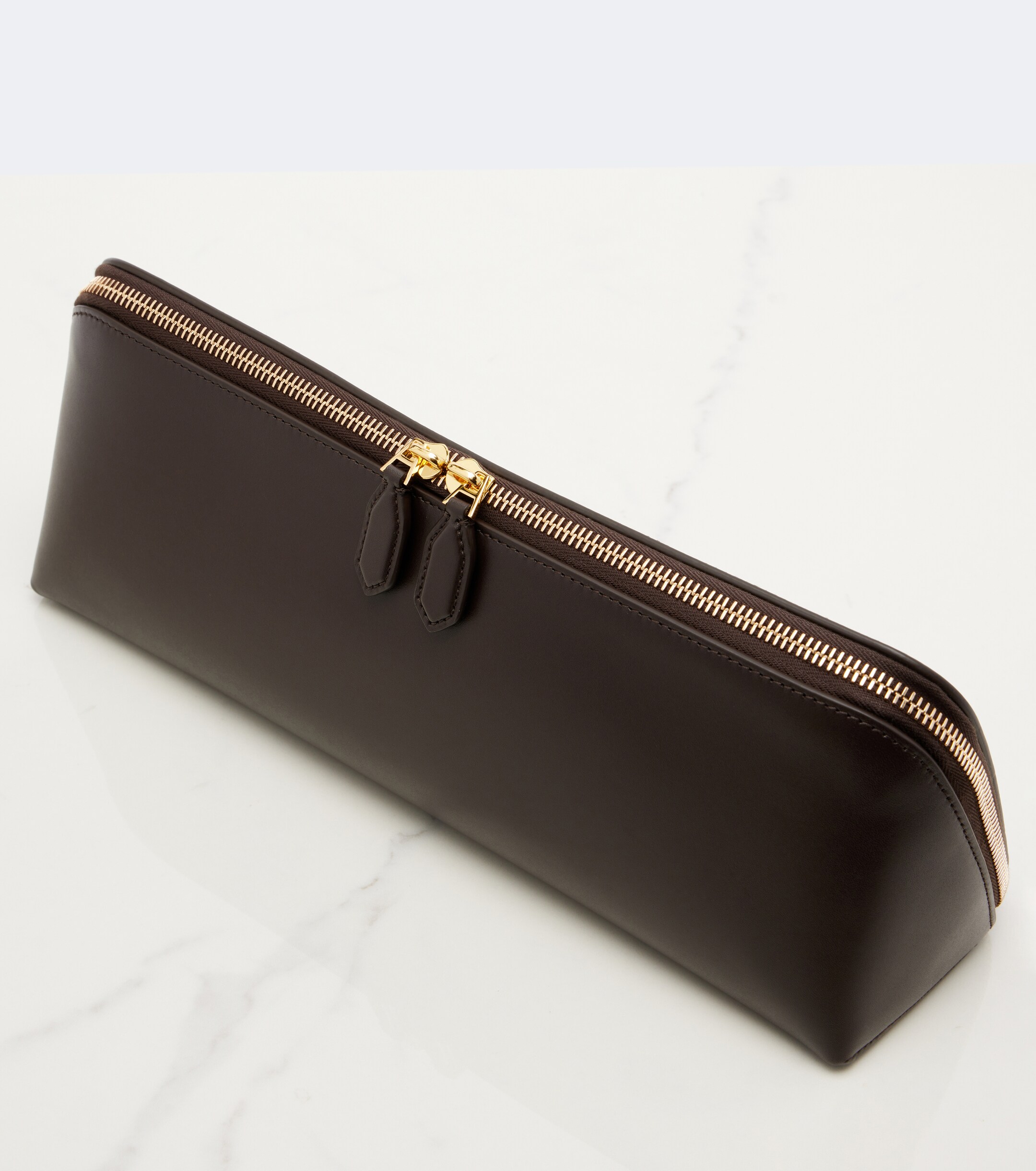 Alaïa Delta Small leather clutch