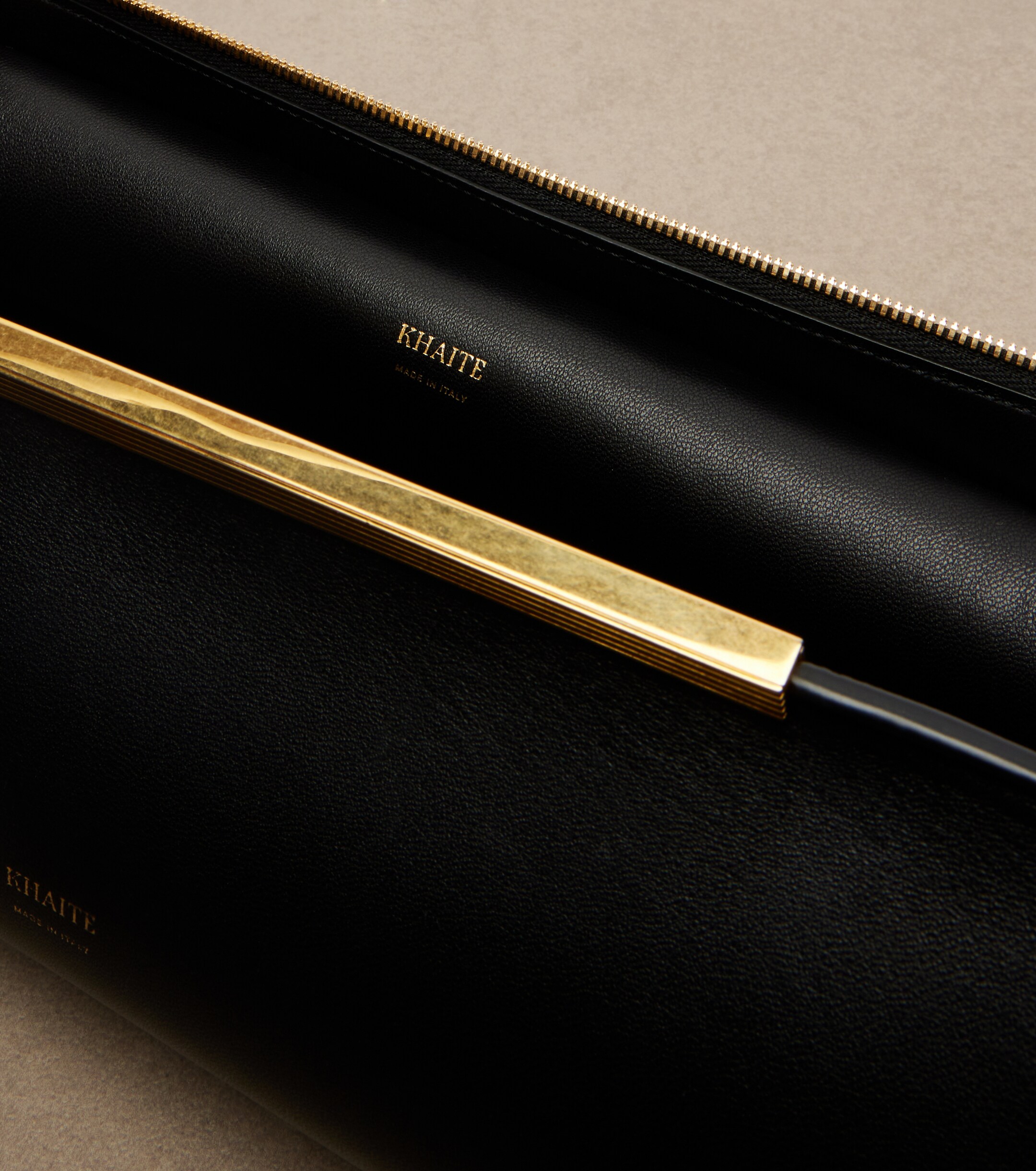 KHAITE Donna leather clutch