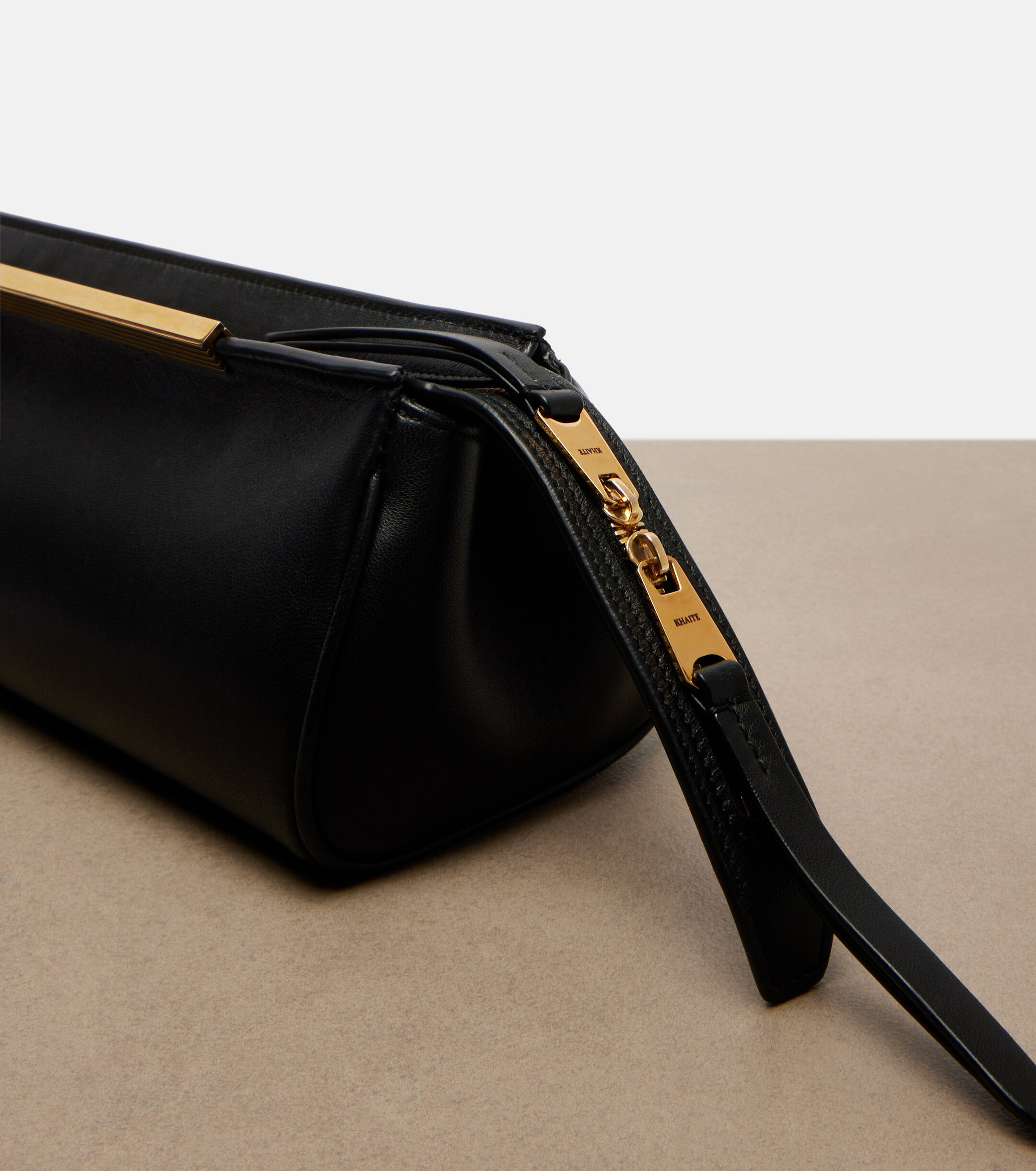 KHAITE Donna leather clutch