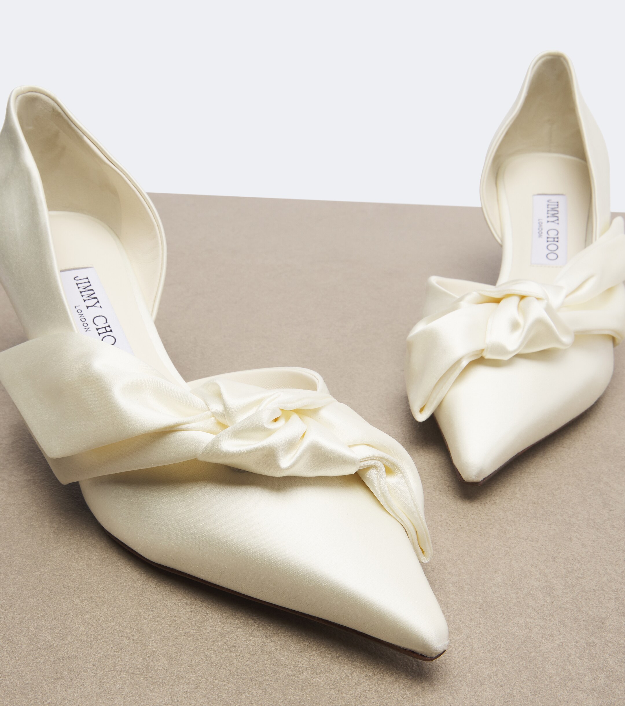 JIMMY CHOO Jimmy Choo Issy bow-detail satin pumps