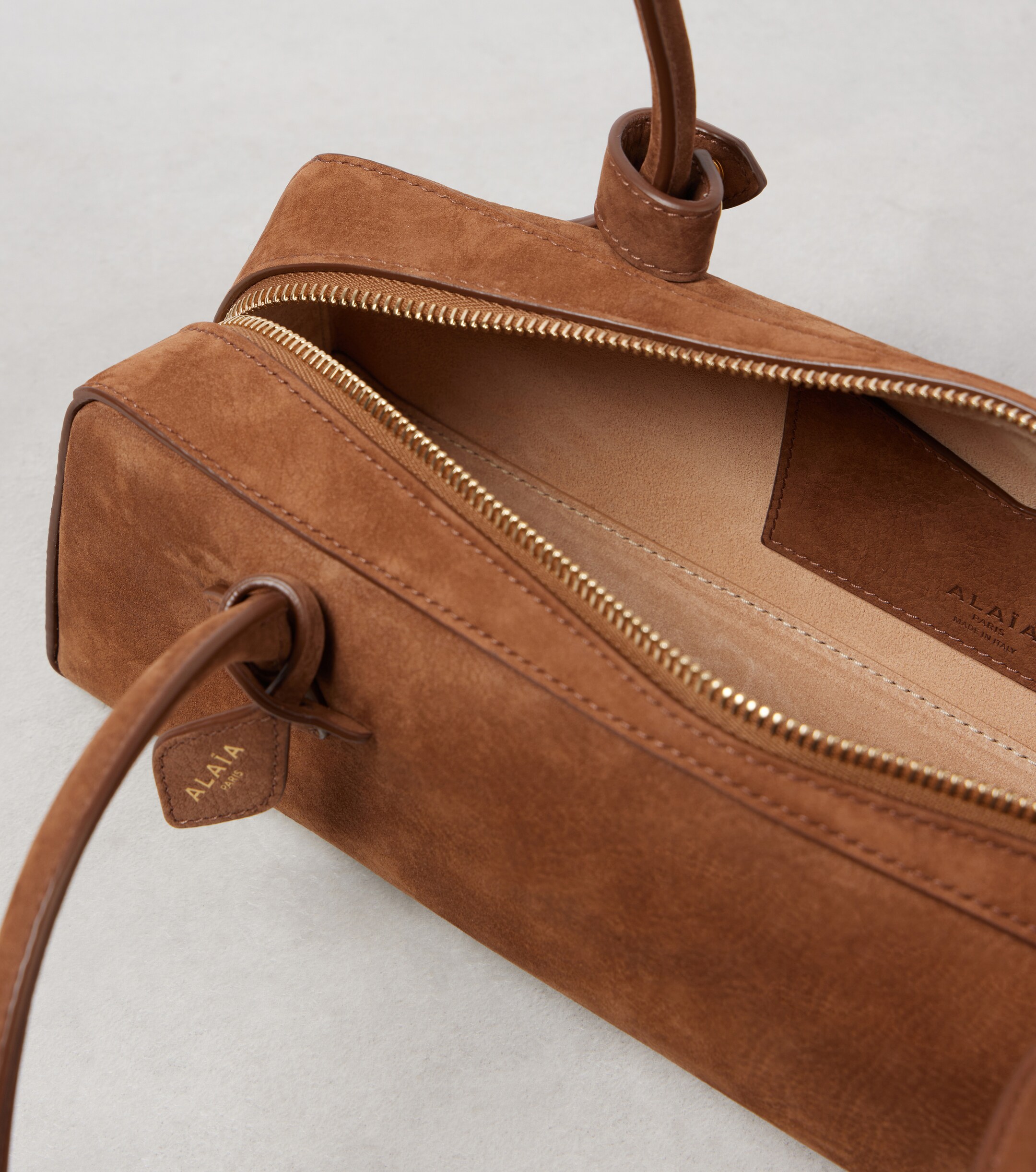 Alaïa Le Teckel Medium suede shoulder bag