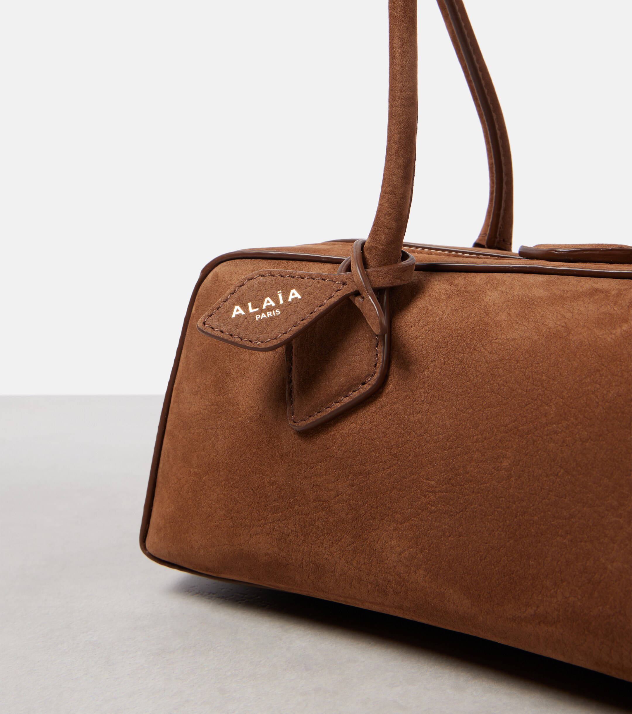 Alaïa Le Teckel Medium suede shoulder bag