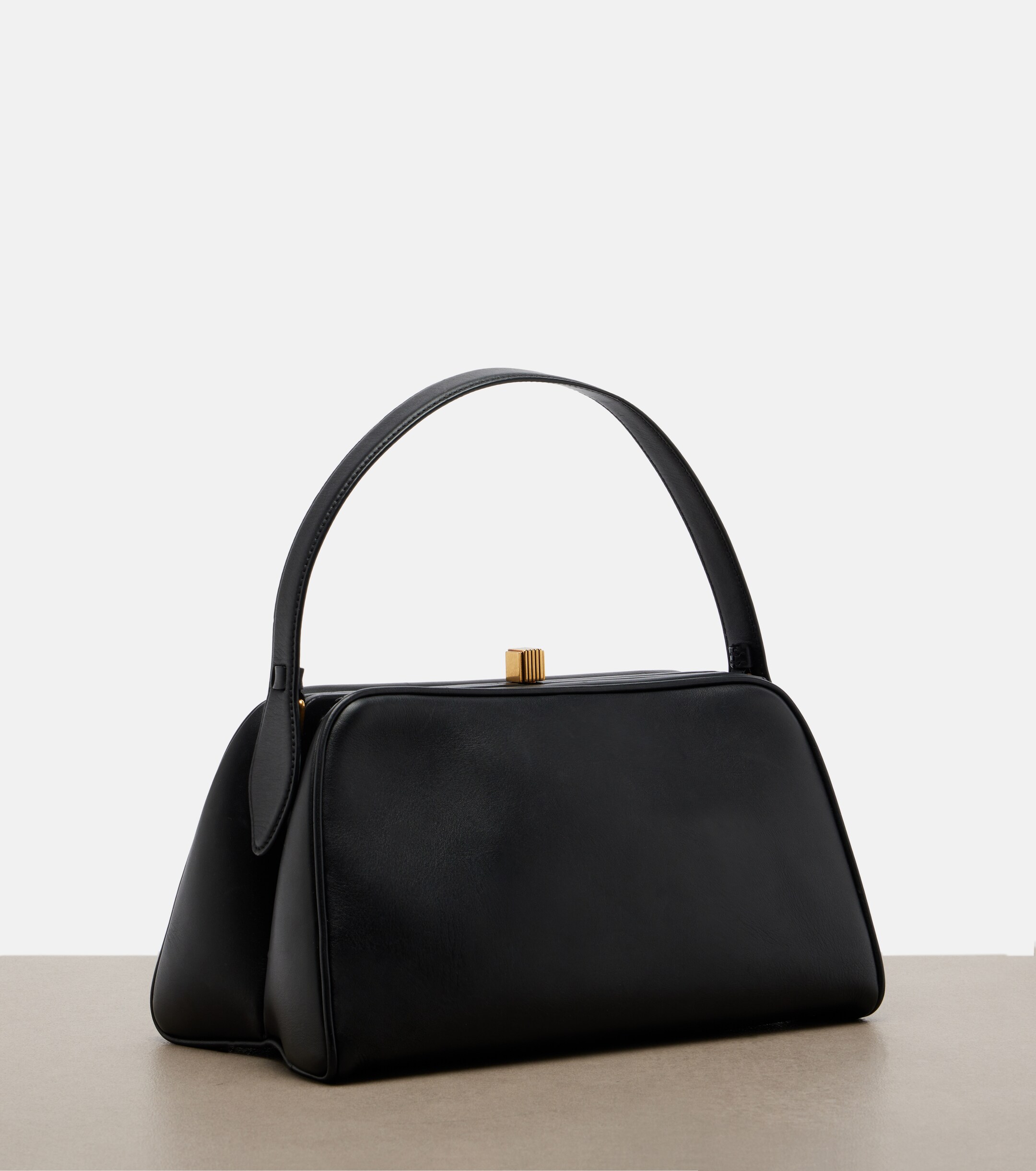 KHAITE Cate leather top-handle bag