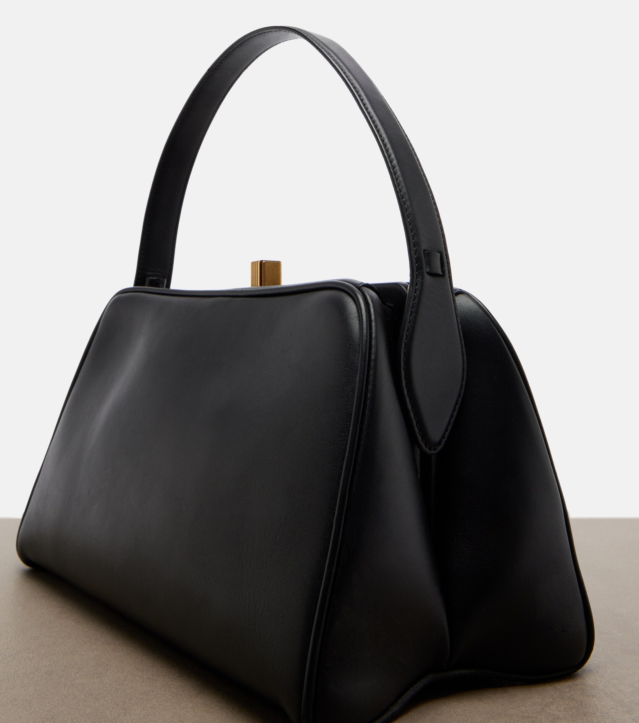 KHAITE Cate leather top-handle bag