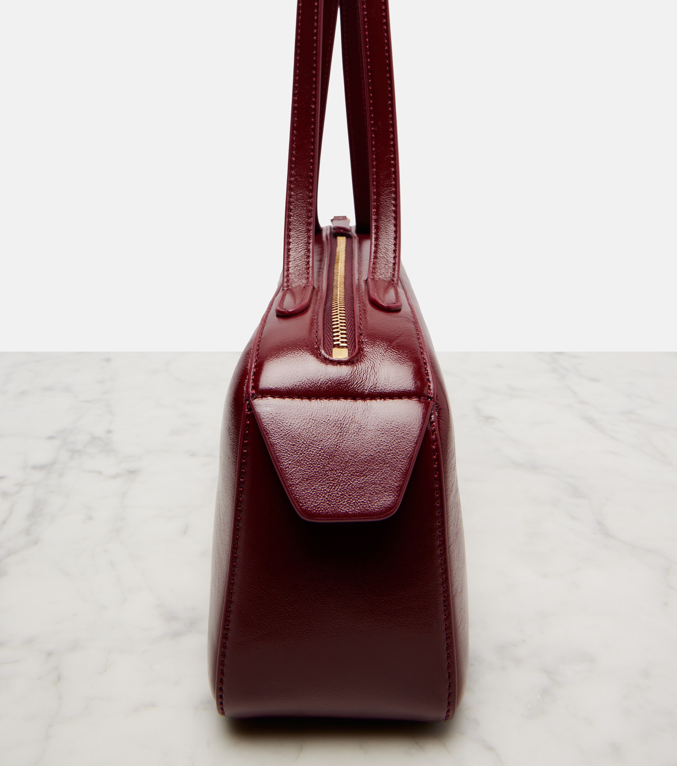 KHAITE Simona patent leather shoulder bag