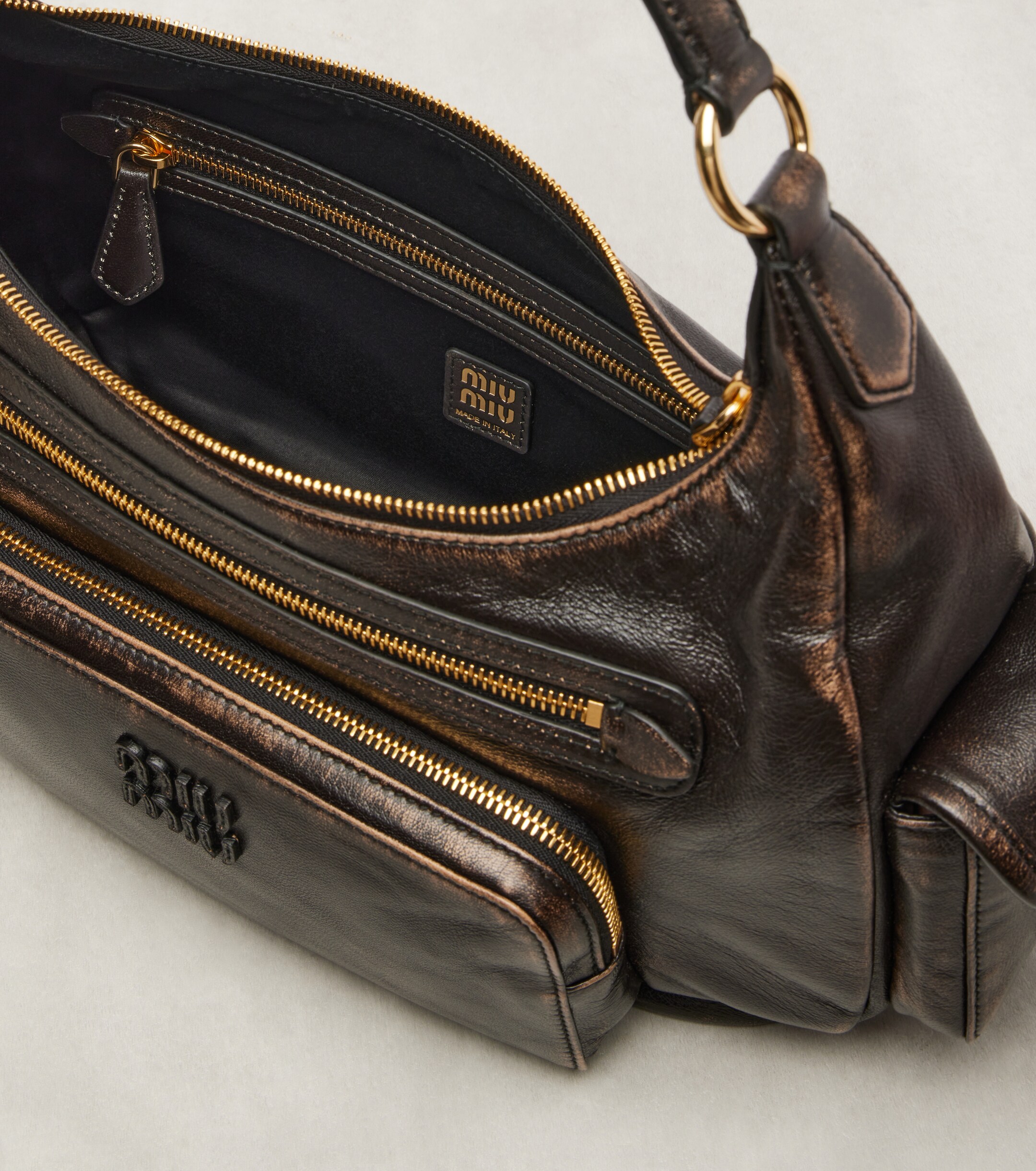 Miu Miu Distressed leather shoulder bag