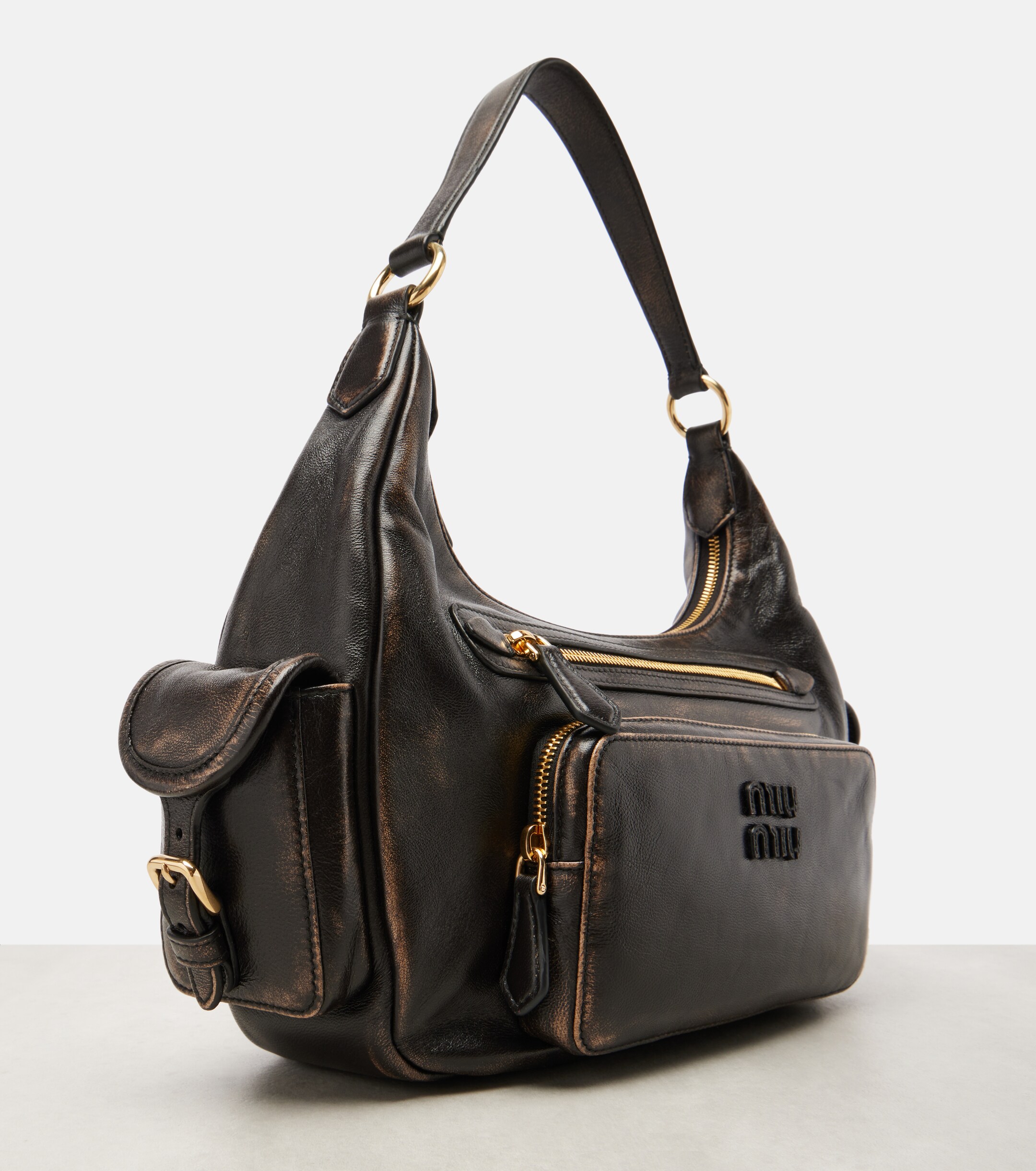 Miu Miu Distressed leather shoulder bag