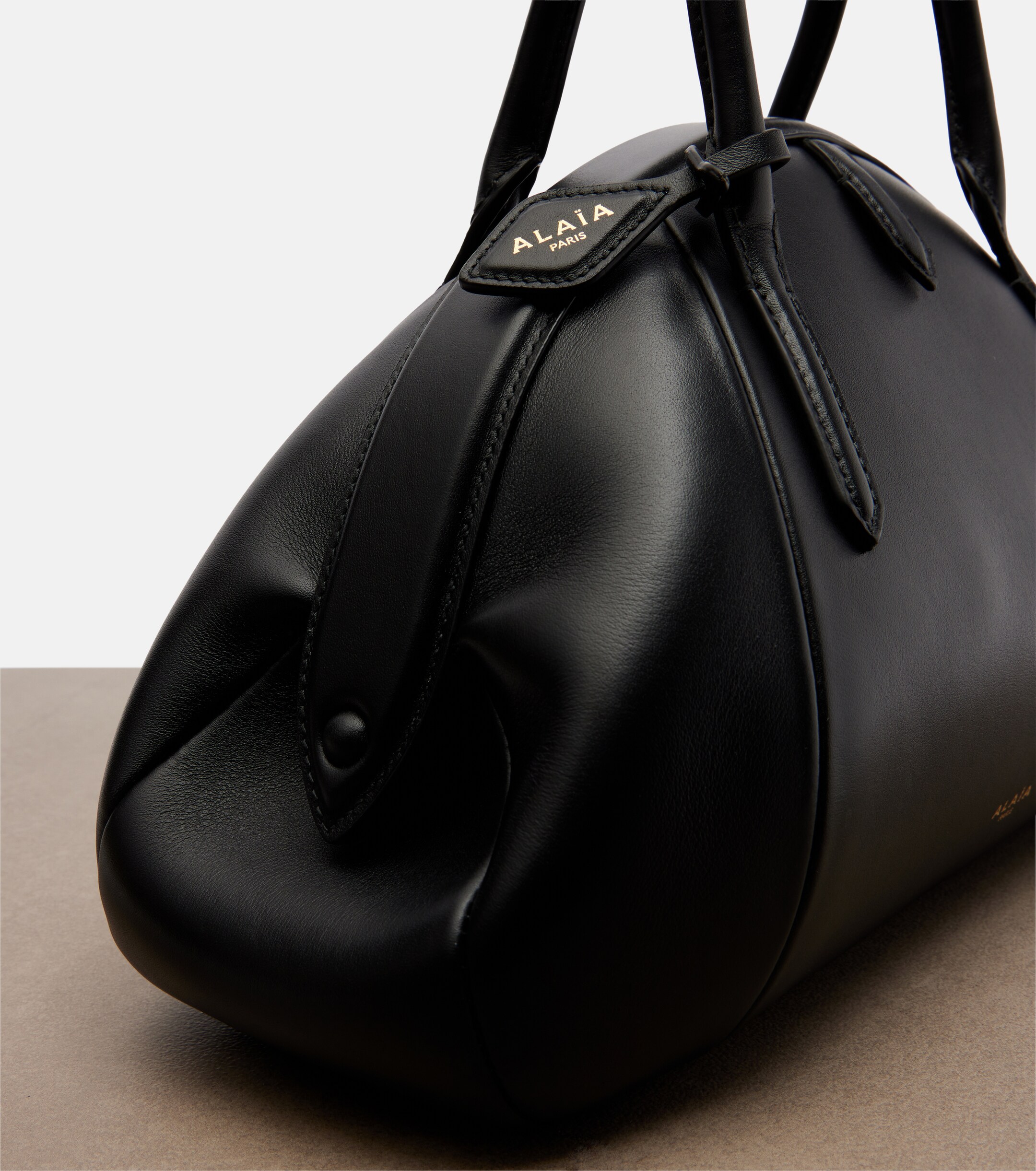 Alaïa Purse Small leather top-handle bag