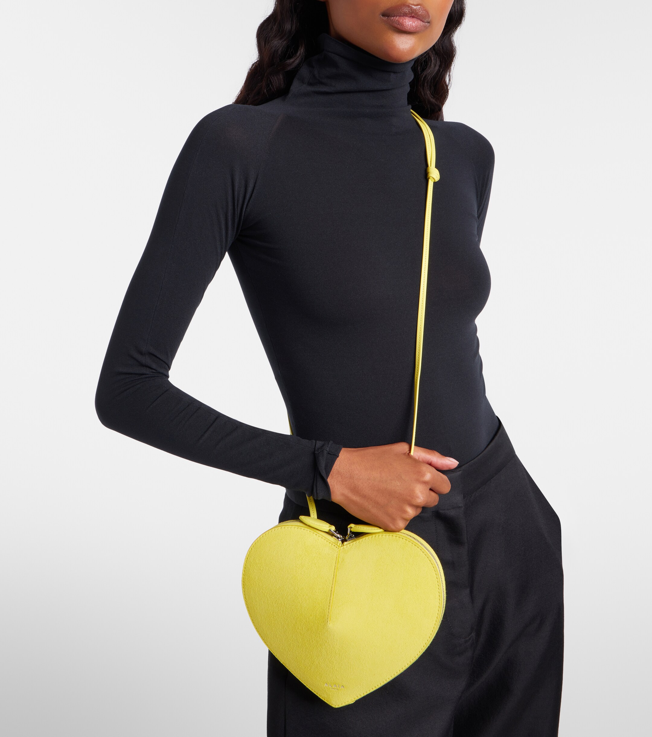 Alaïa Le Cœur leather and suede crossbody bag