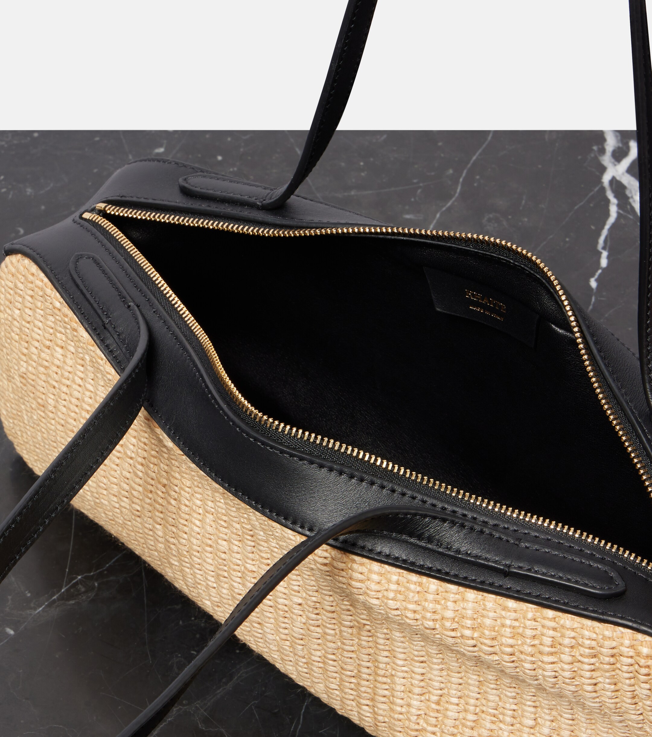 KHAITE Simona leather-trimmed raffia shoulder bag