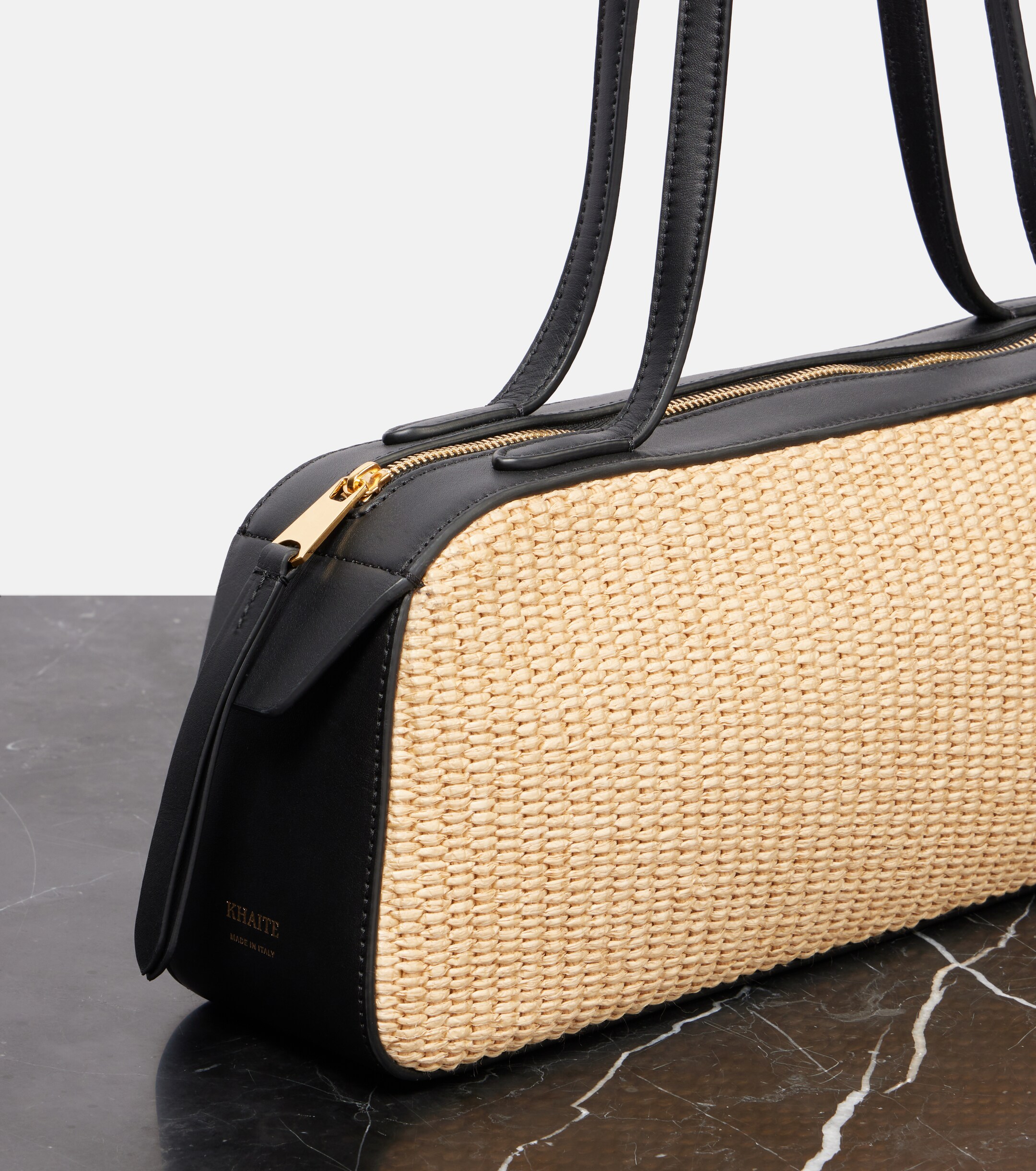 KHAITE Simona leather-trimmed raffia shoulder bag