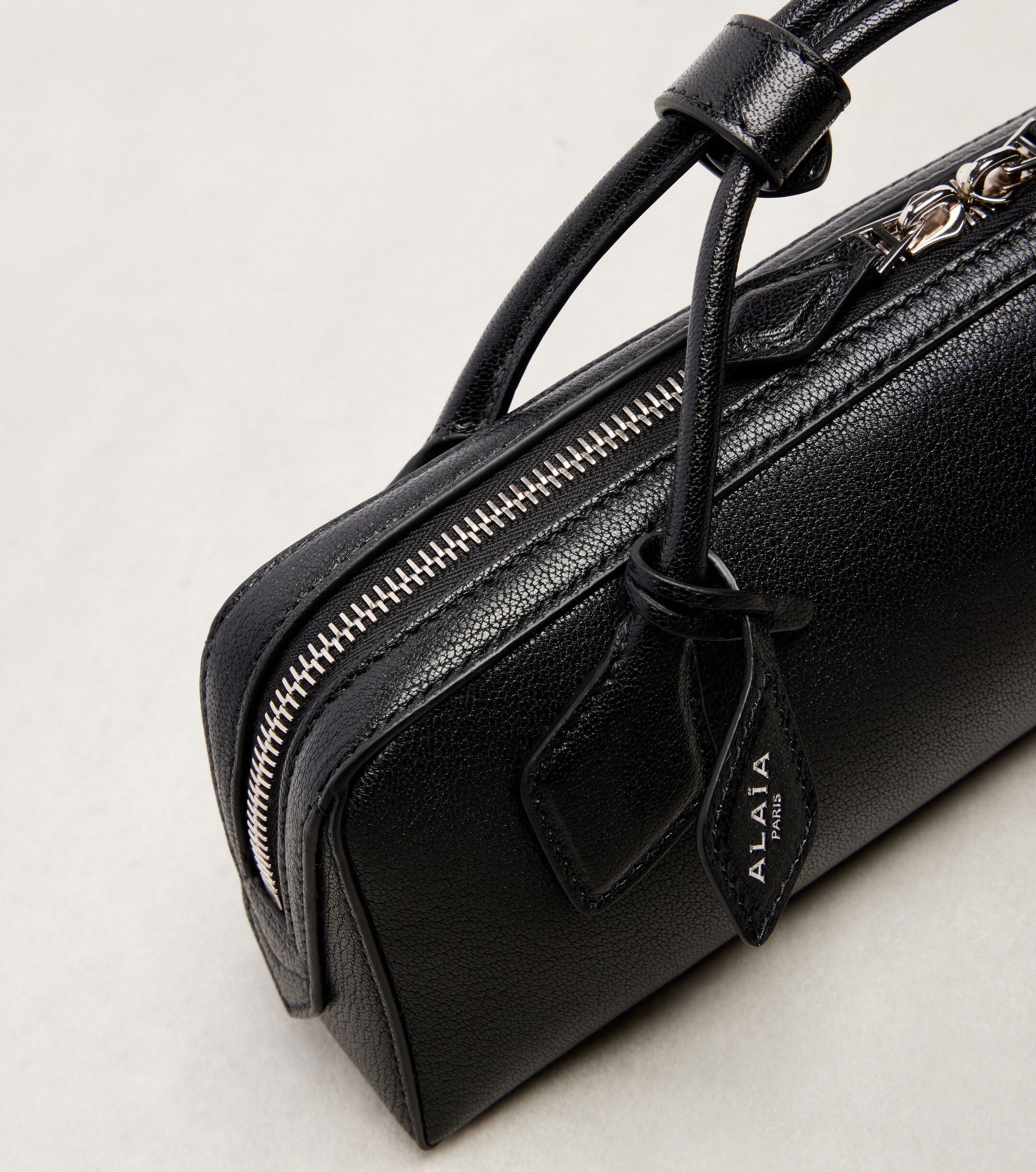 Alaïa Le Teckel Small leather clutch