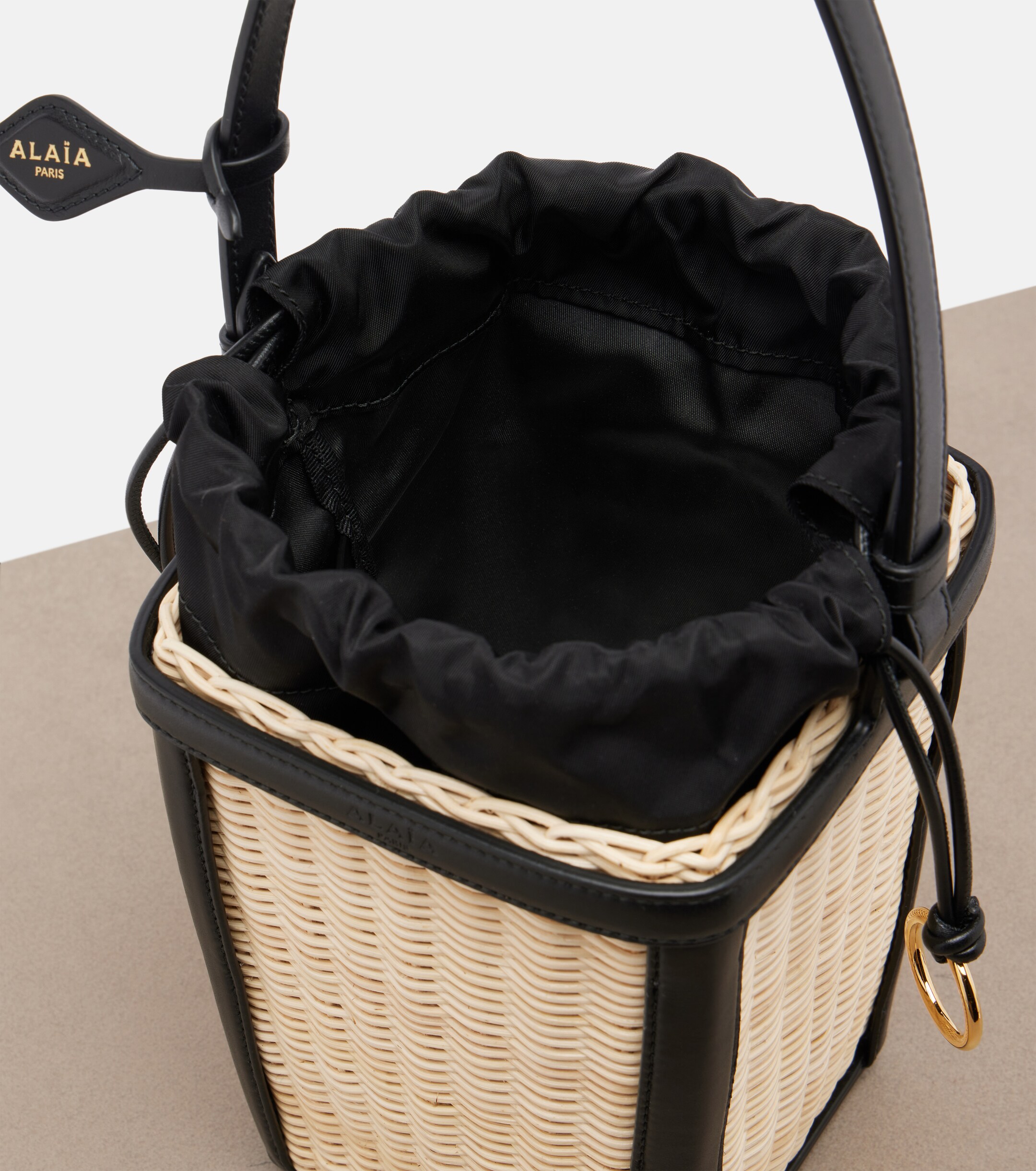 Alaïa Small wicker and leather bucket bag