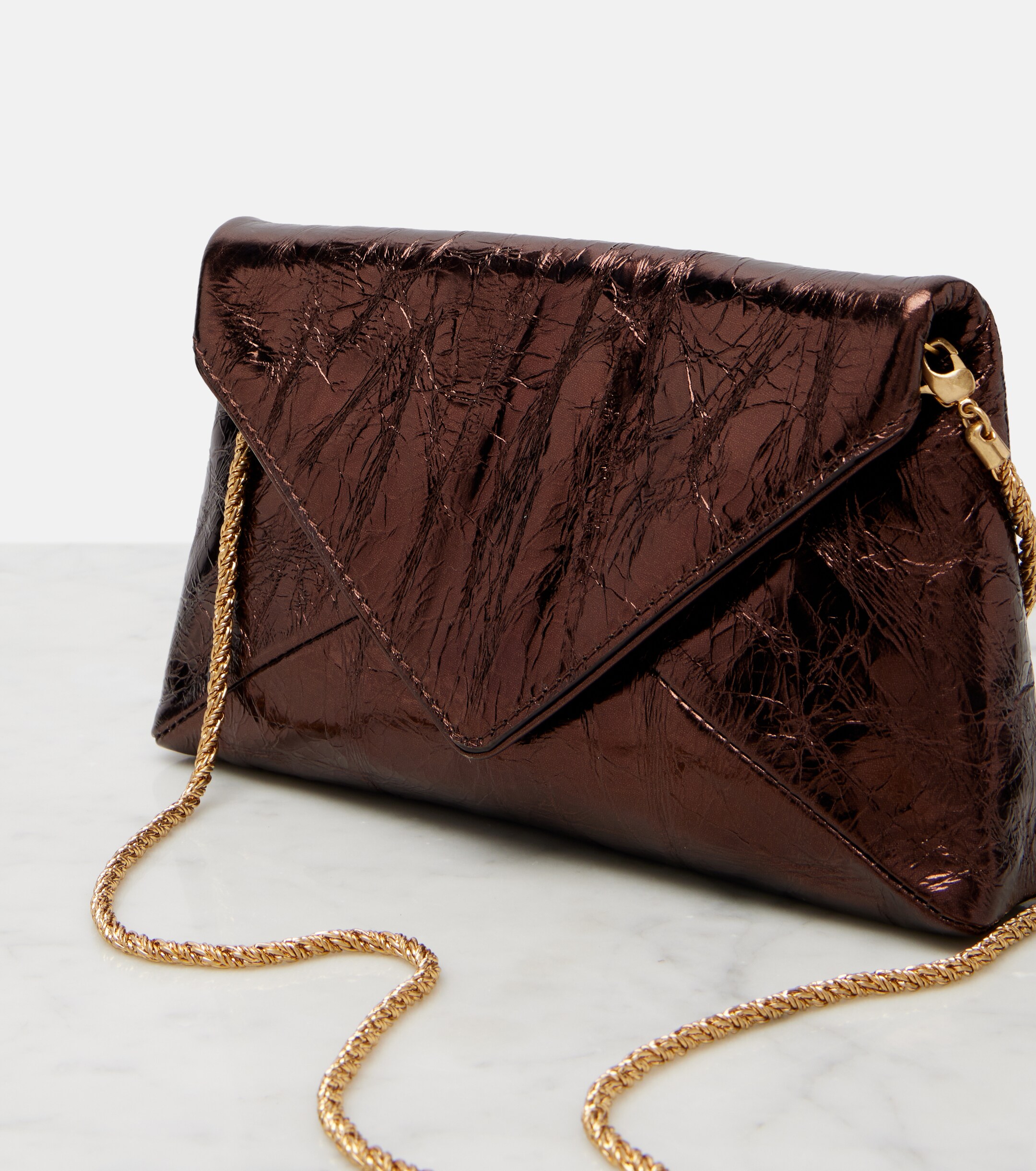 Dries Van Noten Small metallic leather clutch