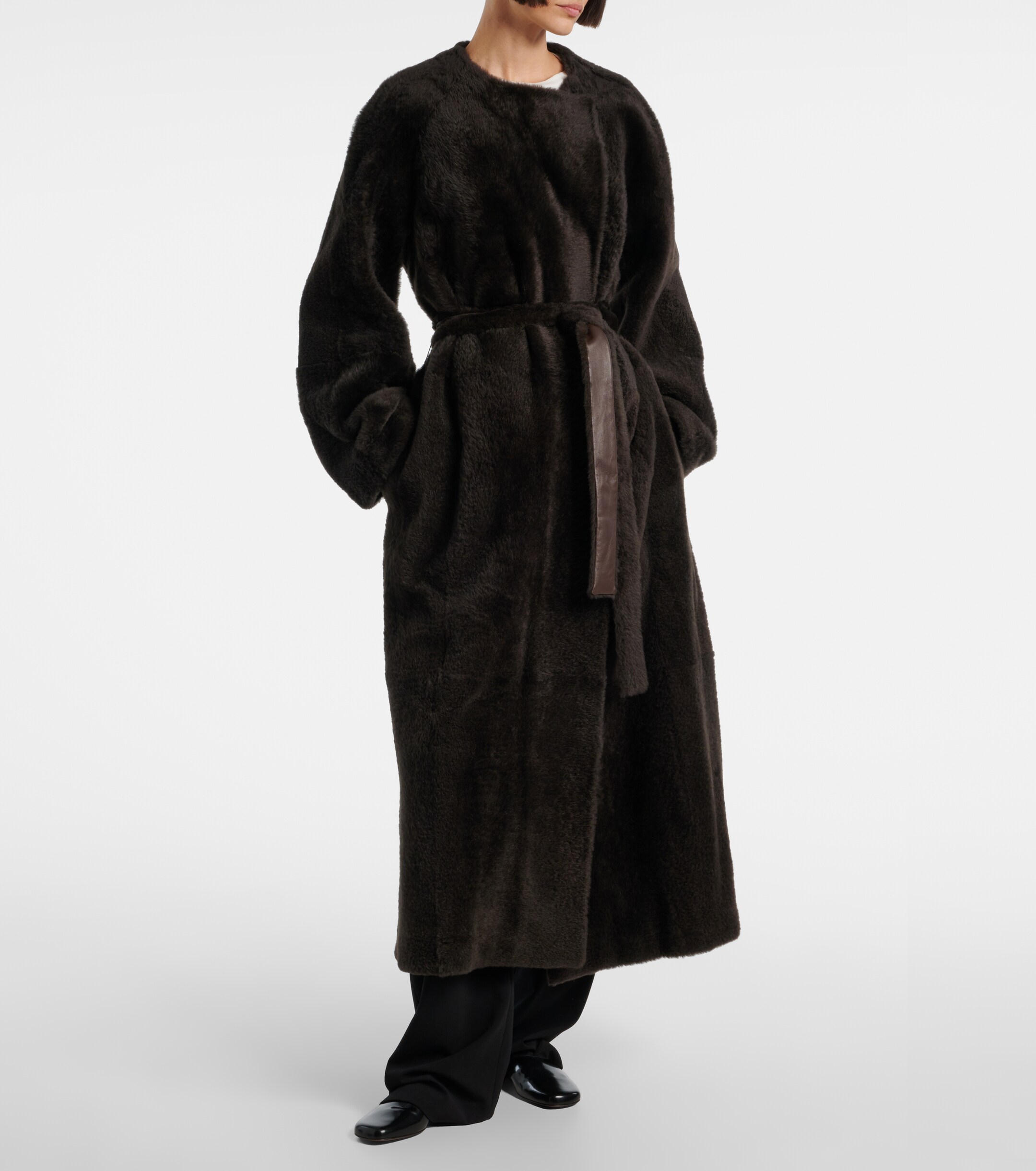 The Row Madelina belted shearling coat