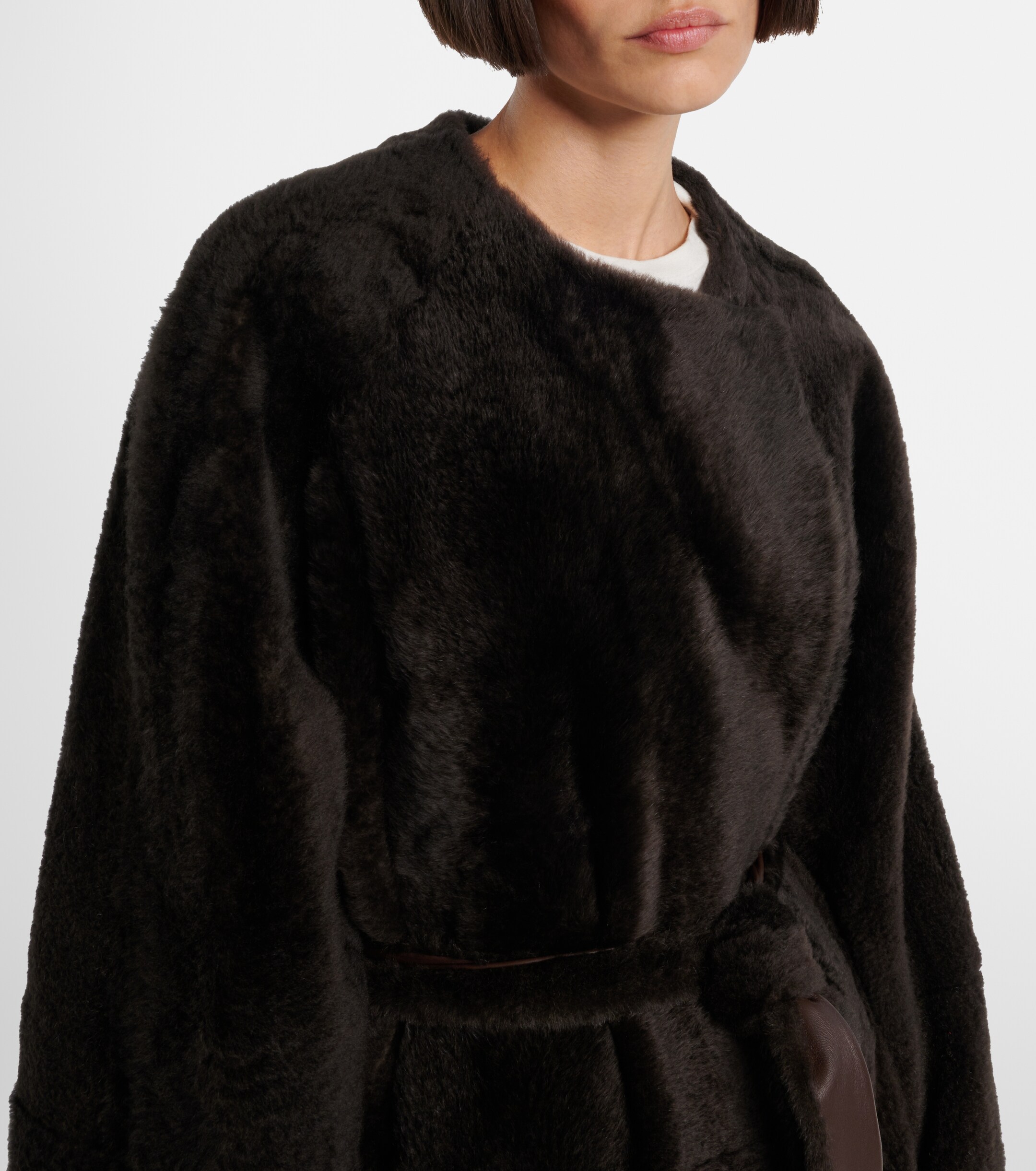 The Row Madelina belted shearling coat