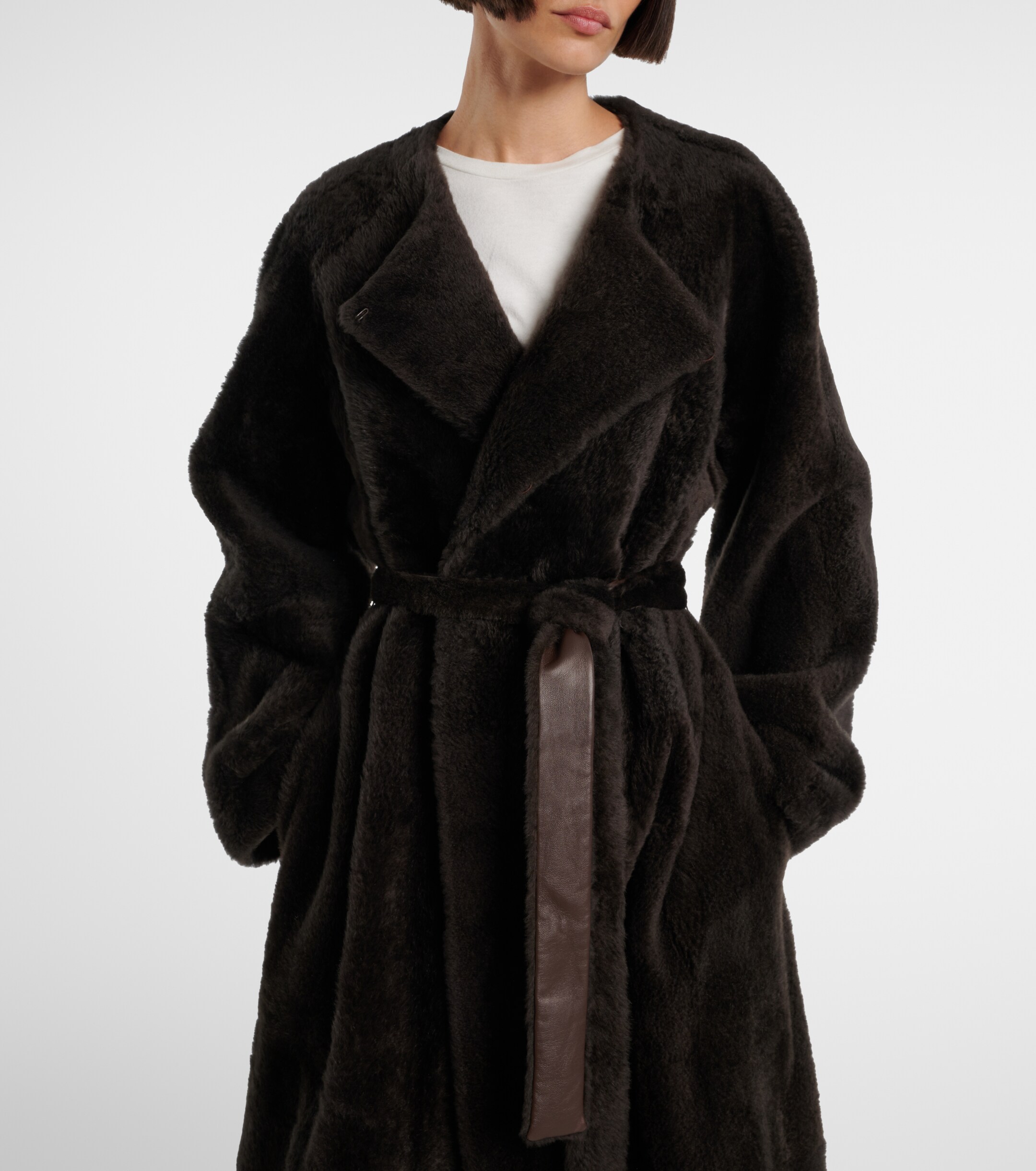 The Row Madelina belted shearling coat